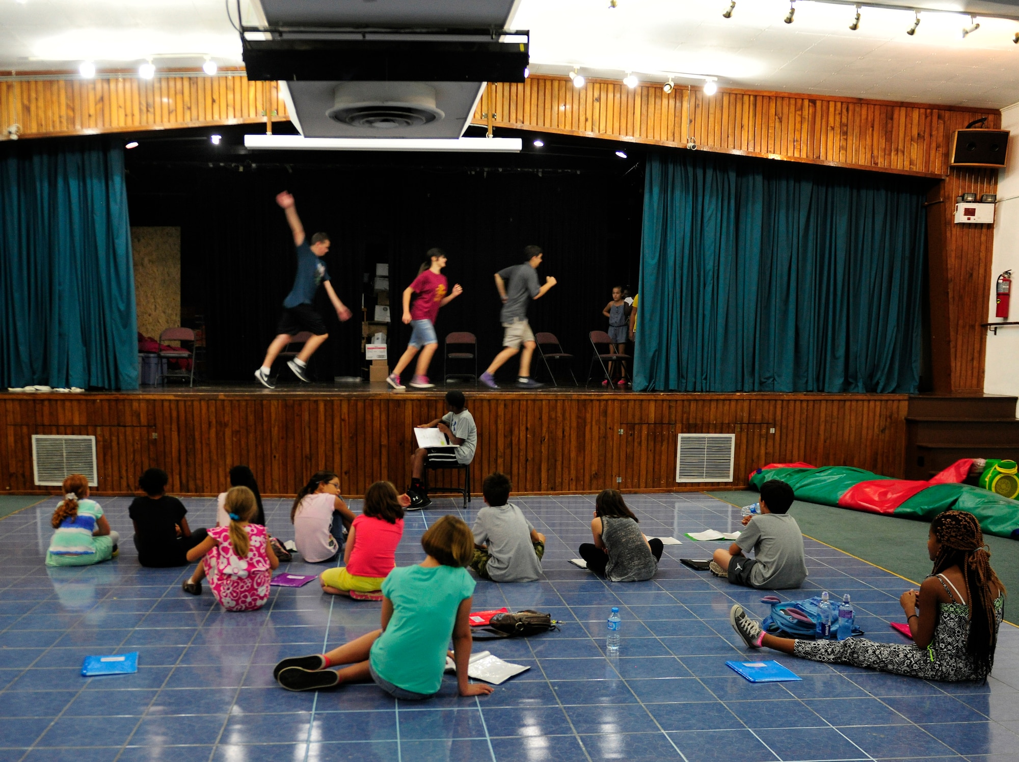 Participants of the Missoula Children’s Theatre rehearse Aug. 6, 2015, at Incirlik Air Base, Turkey. The MCT tours every U.S. Air Force base providing week-long workshops for local children in the first through the twelfth grade. (U.S. Air Force photo by Senior Airman Krystal Ardrey/Released)