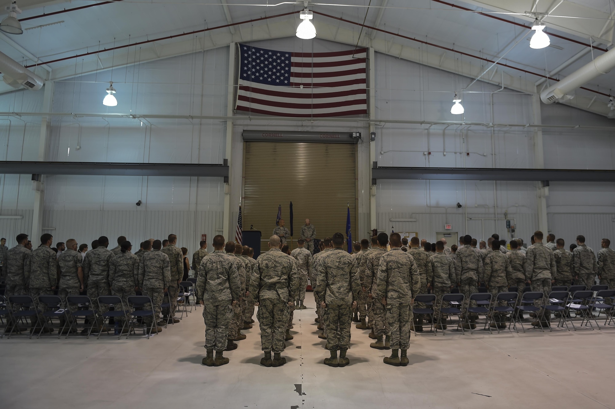 Airmen with the 1st Special Operations Maintenance Squadron stand at attention during the squadron’s activation ceremony, Aug. 10, 2015, at Hurlburt Field, Fla. The 1st SOMXS is a combination of the recently deactivated 1st Special Operations Component Maintenance Squadron and 1st Special Operations Equipment Maintenance Squadron-. (U.S. Air Force photo by Airman 1st Class Ryan Conroy/Released)  