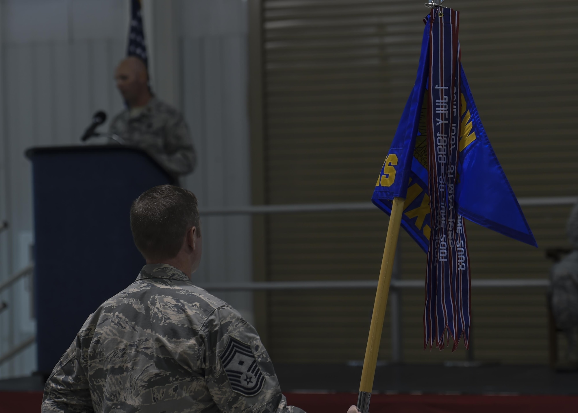 Chief Master Sgt. George Anderson, 1st Special Operations Maintenance Squadron first sergeant, holds the recently-activated 1st SOMXS guidon during an activation ceremony. The newly-activated squadron consists of eight flights with more than 600 active duty, civilian and contracted personnel. (U.S. Air Force photo by Airman 1st Class Ryan Conroy/Released) 