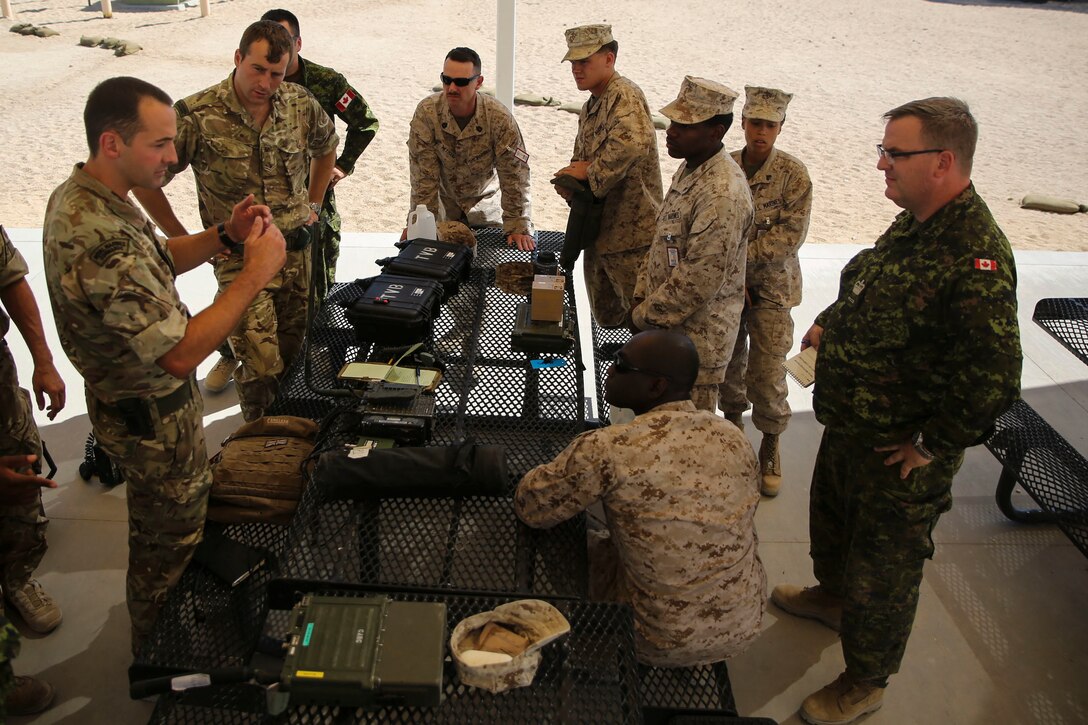 Servicemembers with 2nd Marine Expeditionary Brigade perform an interoperability communication test with their Canadian and British counterparts at Camp Wilson aboard Marine Corps Air Ground Combat Center, Calif., in support of the 2nd MEB Large Scale Exercise Aug. 12, 2015. LSE is a combined U.S. Marine Corps, Canadian, and British exercise conducted at the Brigade-level, designed to enable live, virtual and constructive training for participating forces.