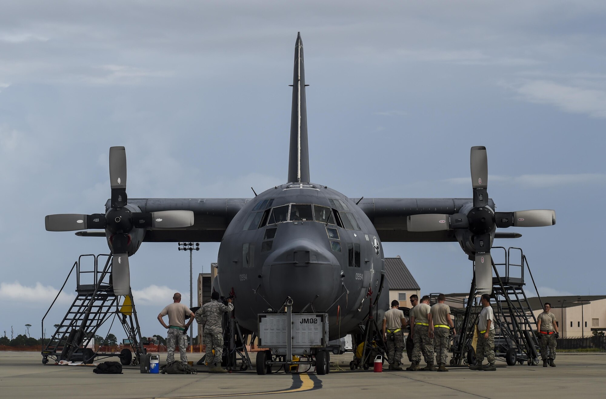 Airmen with the 1st Special Operations Wing lower an MC-130P Combat Shadow after removing both wings on Hurlburt Field, Fla., Aug. 5, 2015. The MC-130P Combat Shadow, “Team Shadow,” and an AC-130H Specter, “Wicked Wanda,” were towed to the Hurlburt Field Air Park Aug. 15, 2015. (U.S. Air Force photo by Airman Kai White/Released)