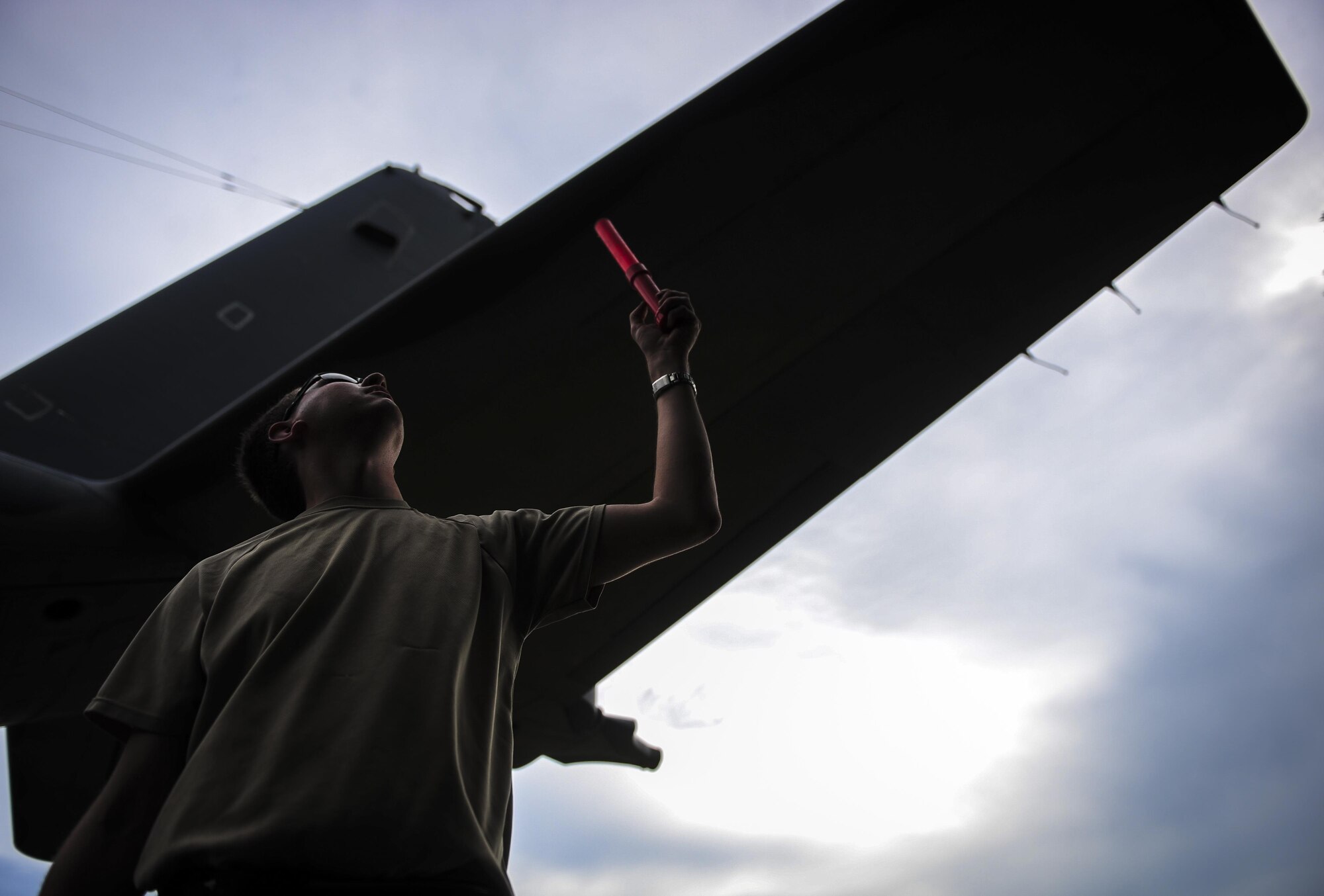 A maintainer with the 1st Special Operations Aircraft Maintenance Squadron watches the tail of an AC-130H Spectre as it’s towed down Independence Road on Hurlburt Field, Fla., Aug. 15, 2015. More than 40 personnel with eight base organizations were on site during the tow process. The AC-130H Spectre will be displayed at the North end of the Air Park. (U.S. Air Force photo by Senior Airman Meagan Schutter/Released)