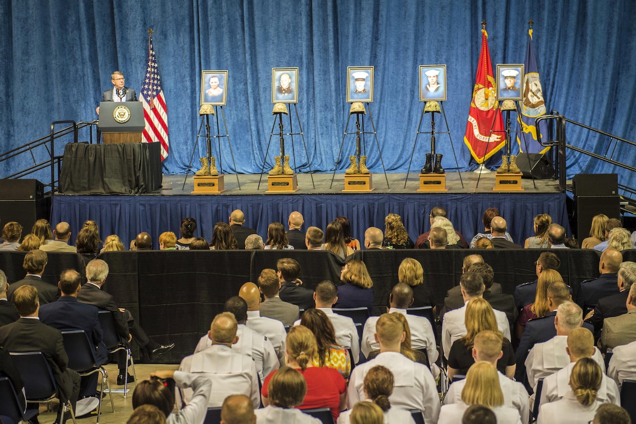 Defense Secretary Ash Carter offers comments during the memorial service for five slain service members at the University of Tennessee in Chattanooga, Tenn., Aug. 15, 2015. Carter joined Vice President Joe Biden at the event, which honored the four Marines and one sailor who died from the July 16 shooting at the Navy Operational Support Center in Chattanooga.