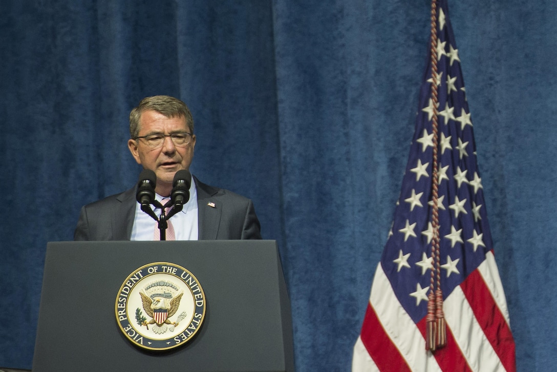 Defense Secretary Ash Carter offers remarks to honor five slain service members during a memorial service in Chattanooga, Tenn.,  Aug. 15, 2015. The five service members were killed during a July 16 shooting.