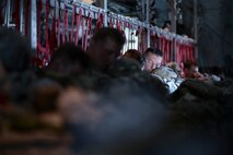 A U.S. Army Soldier with the 1st Battalion (Airborne), 501st Infantry Regiment, falls asleep while waiting to jump from a U.S. Air Force C-130 Hercules from Yokota Air Base, Japan, during Red Flag-Alaska at Joint Base Elmendorf-Richardson, Alaska, Aug. 12, 2015. More than 60 U.S. Army Soldiers with the 1-501 Parachute Infantry Regiment and more than 20 Japan Ground Self-Defense Force members jumped from multiple C-130 Hercules during the training. More than 20 allied countries have participated in RED FLAG-Alaska since its conception, improving integration, interoperability and cross-cultural competence. (U.S. Air Force photo by Staff Sgt. Cody H. Ramirez/Released)