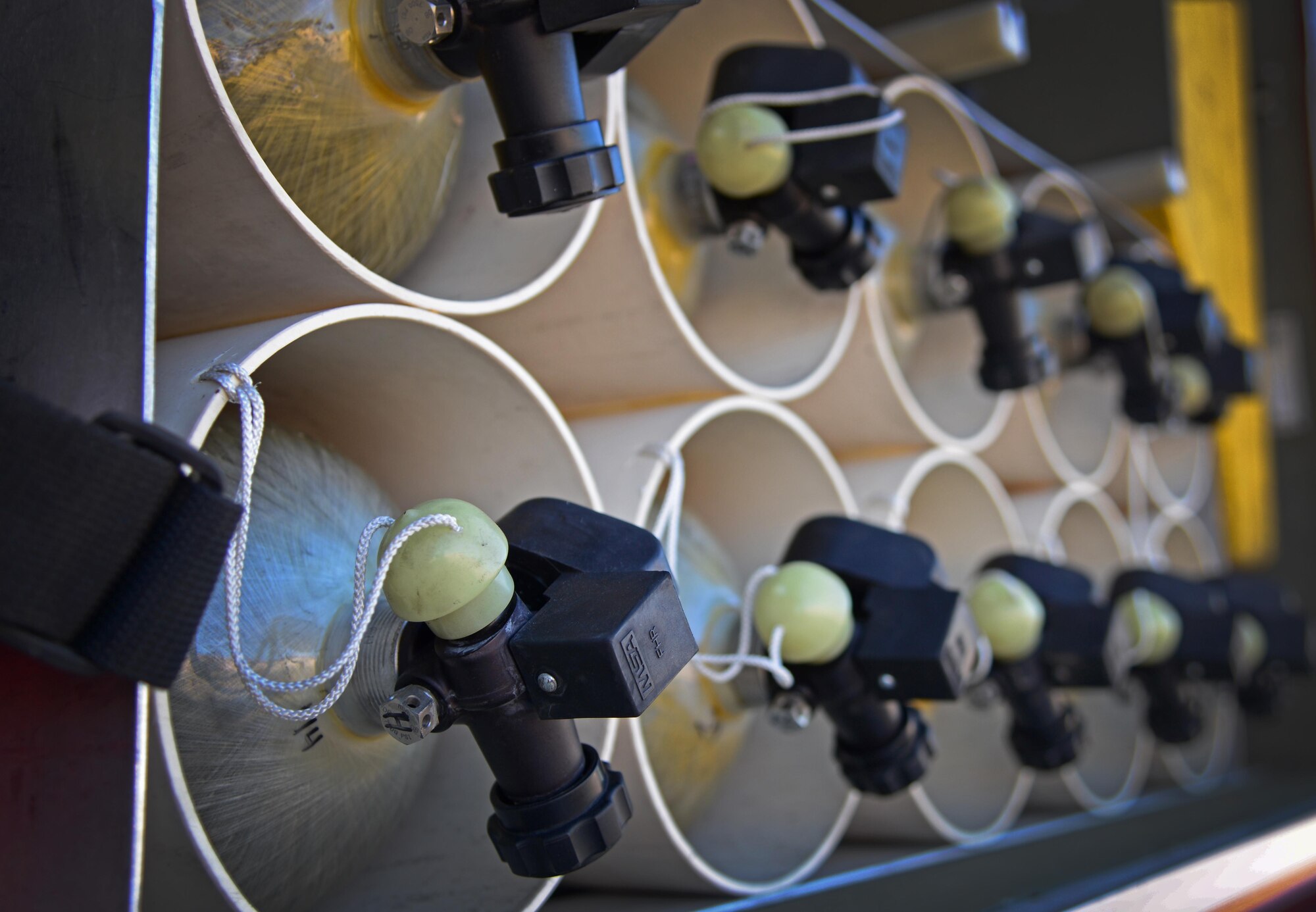 Backup oxygen tanks are fully stocked in a fire rescue vehicle during an exercise Aug. 4, 2015 at Cannon Air Force Base, N.M. Exercising response capabilities is nothing new to Team Cannon; whether base-wide or inter-agency, conducting routine training is an ideal way to keep Air Commandos qualified in their career fields and ready to own the fight forward when called upon. (U.S. Air Force photo/Staff Sgt. Alexx Mercer)