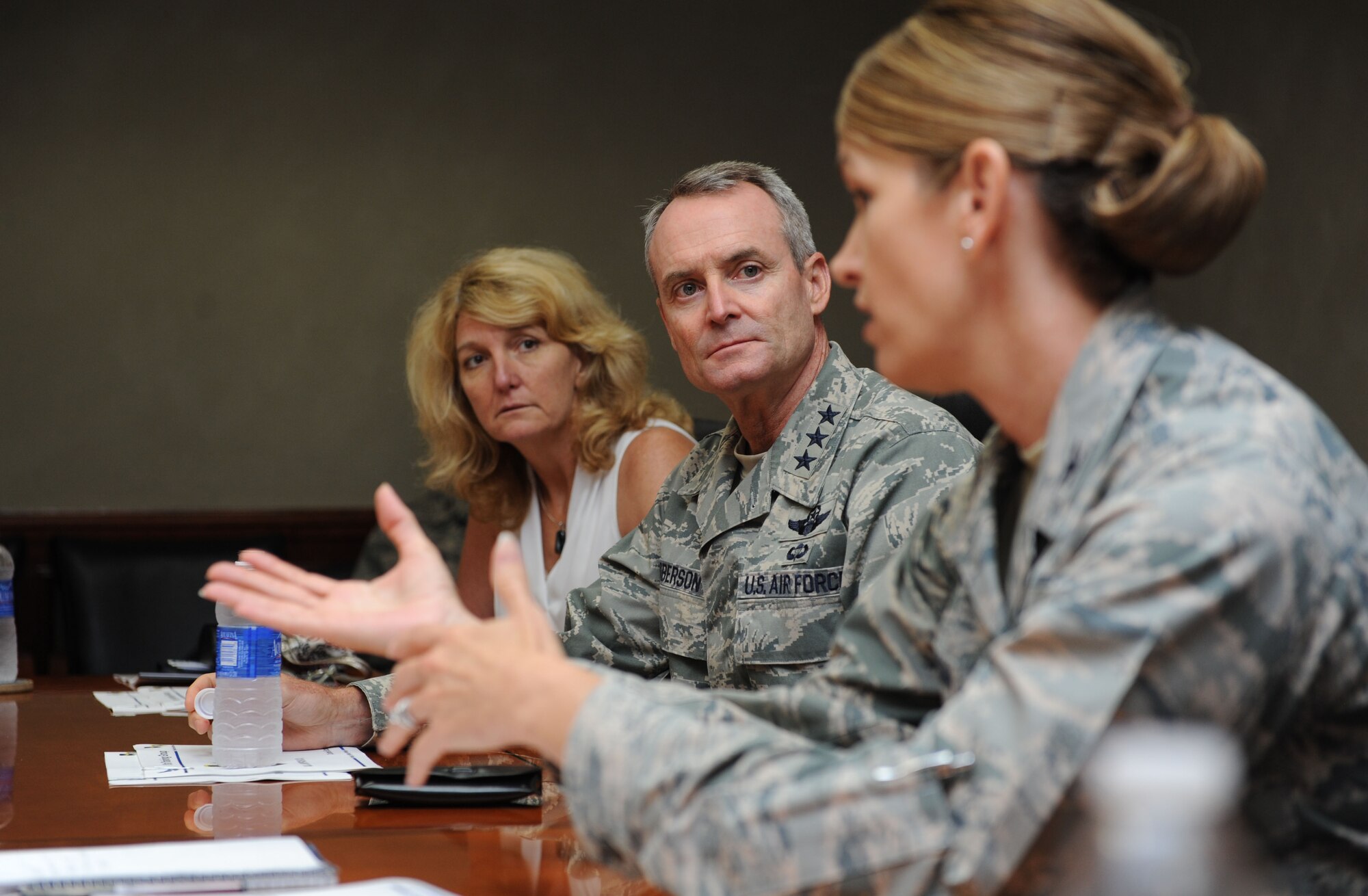 Lt. Gen. Darryl Roberson, commander of Air Education and Training Command, and his wife, Cheryl, watch as Col. Michele Edmondson, 81st Training Wing commander, makes remarks during an 81st Training Group mission brief at a site visit, Aug. 12, 2015 Keesler Air Force Base, Mississippi. Roberson was also accompanied by Chief Master Sgt. Gerardo Tapia, AETC command chief. The two-day visit also included a base all call and tours of the 81st Medical Group, the Levitow Training Support Facility, the Trainer Development Center and 2nd Air Force headquarters. (U.S. Air Force photo by Kemberly Groue)