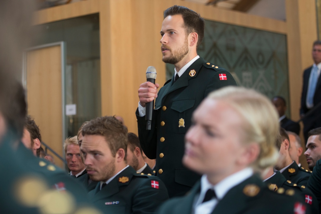 A Danish army cadet ask a question to U.S. Army Gen. Martin E. Dempsey, chairman of the Joint Chiefs of Staff, at the Royal Danish Army Academy in Copenhagen, Denmark, Aug. 17, 2015. DoD photo by D. Myles Cullen