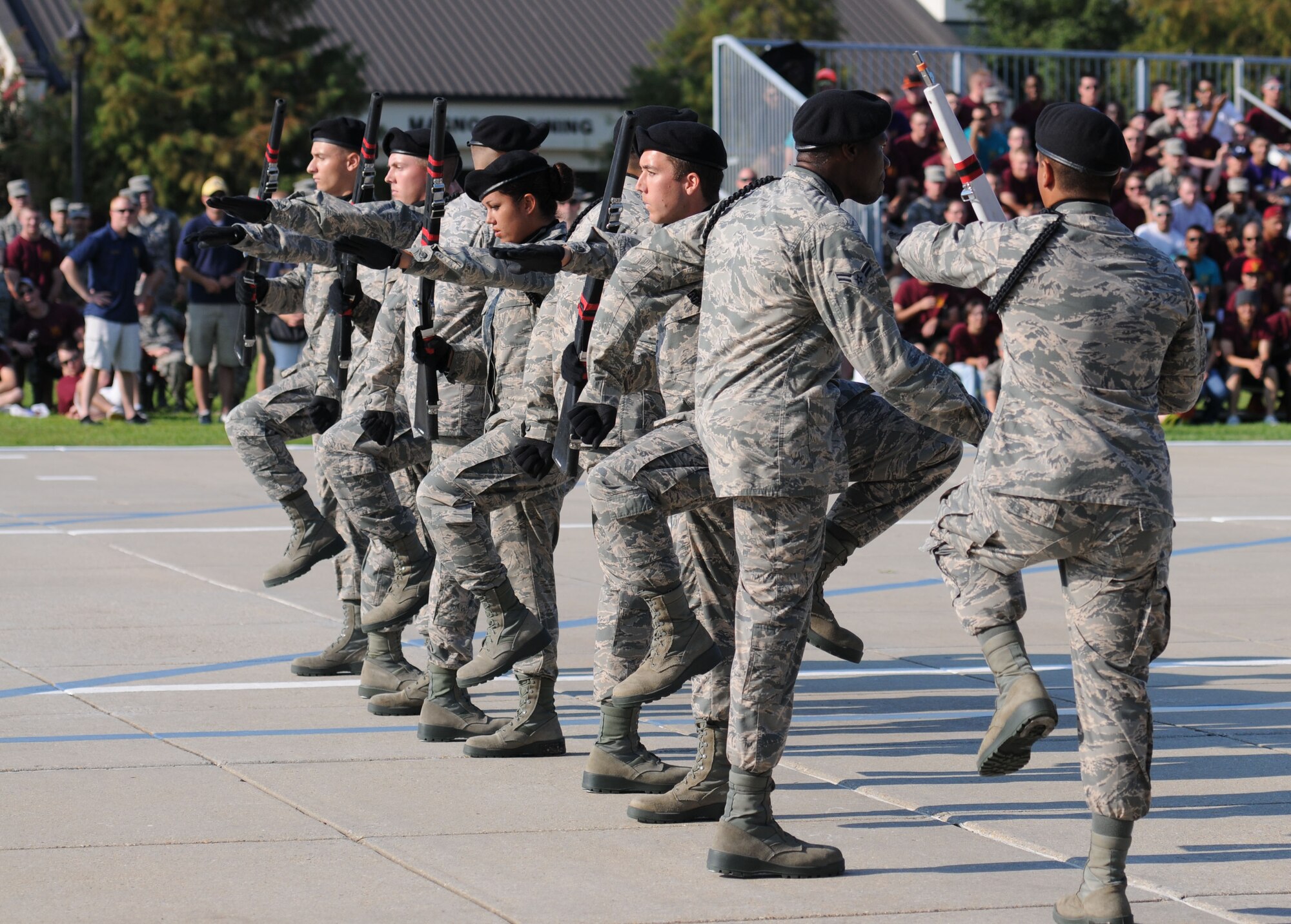 Members of the 336th Training Squadron freestyle drill team perform during the 81st Training Group drill down Aug. 14, 2015, at the Levitow Training Support Facility Drill Pad, Keesler Air Force Base, Miss. The 336th TRS “Red Wolves” placed first in freestyle and second overall. (U.S. Air Force photo by Kemberly Groue)