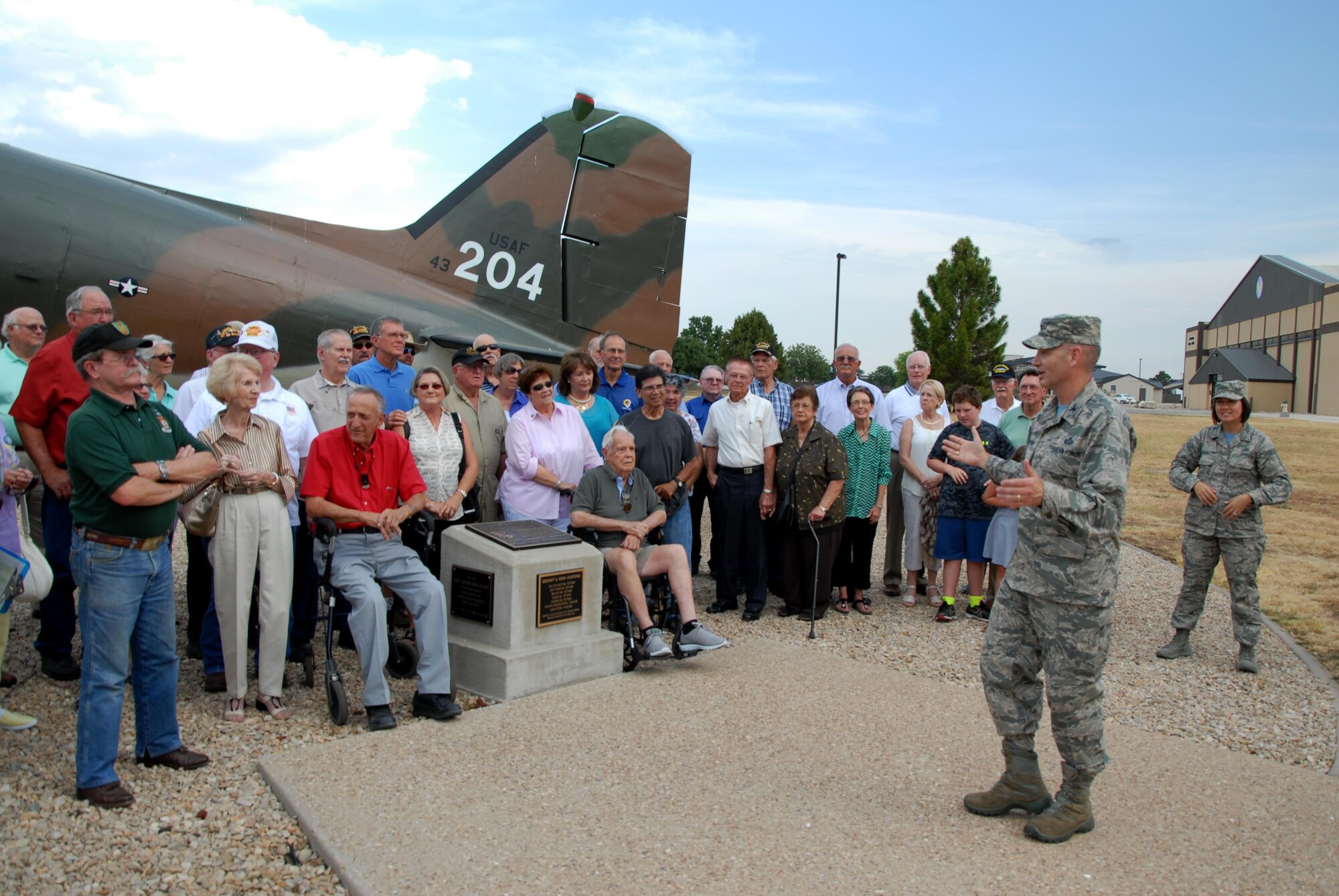 U.S. Air Force Col. Michael L. Downs, 17th Training Wing Commander, speaks to retired Vietnam War Veterans and their families during a base visit at the Norma Brown Building on Goodfellow Air Force Base, Texas, Aug. 14, 2015. Team Goodfellow and Angelo State University teamed up to honor the men and women who served 50 years ago during the Vietnam War. (U.S. Air Force photo by Senior Airman Joshua Edwards/Released)