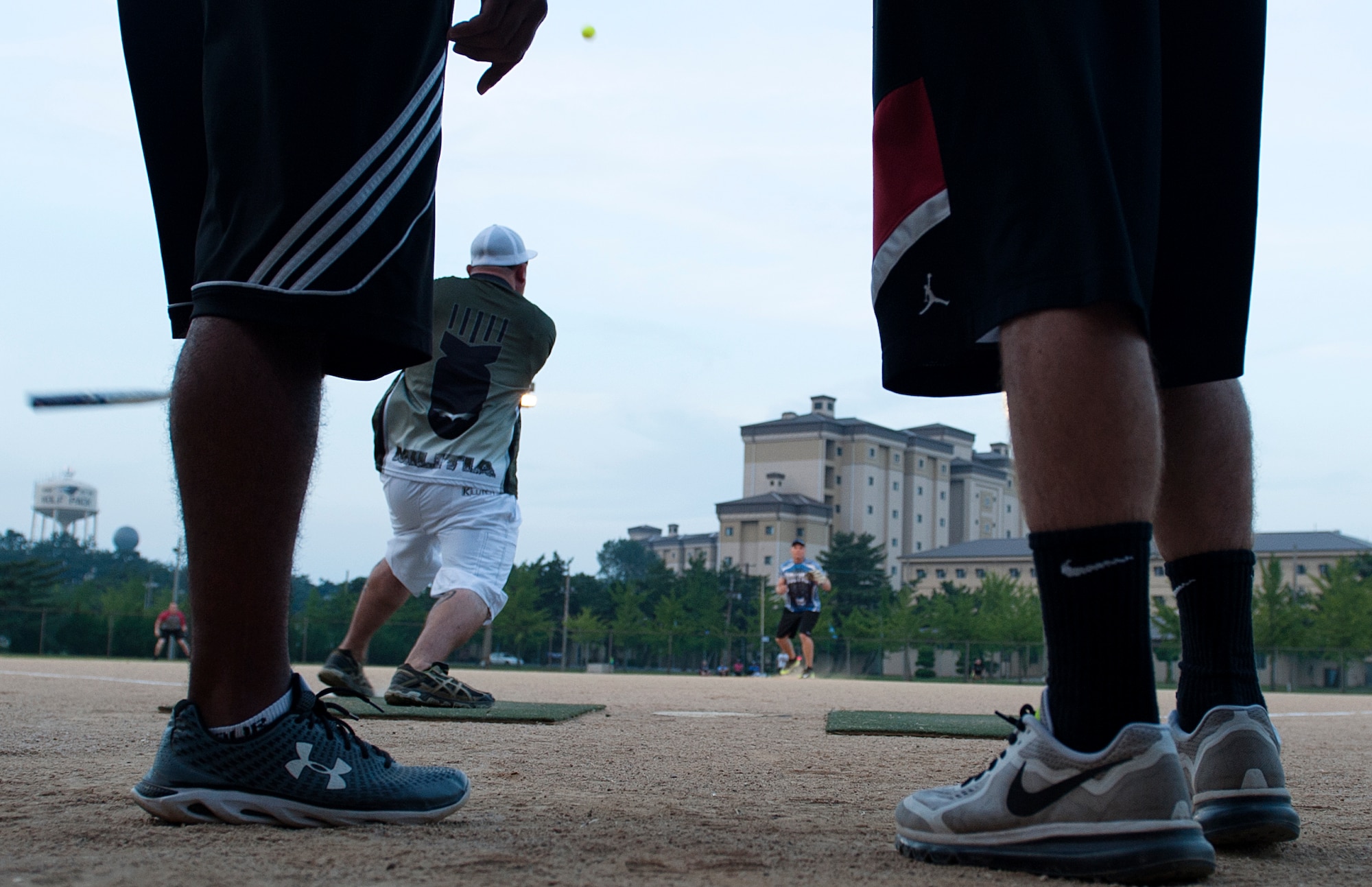 Staff Sgt. Adam Bartels, 8th Maintenance Squadron corrosion control, hits the ball during the intramural softball championship game at Kunsan Air Base, Republic of Korea, Aug. 17, 2015. The game’s final score ended with the MXS dragons defeating the 8th Security Forces Squadron 16 to 5. (U.S. Air Force photo by Senior Airman Divine Cox/Released)