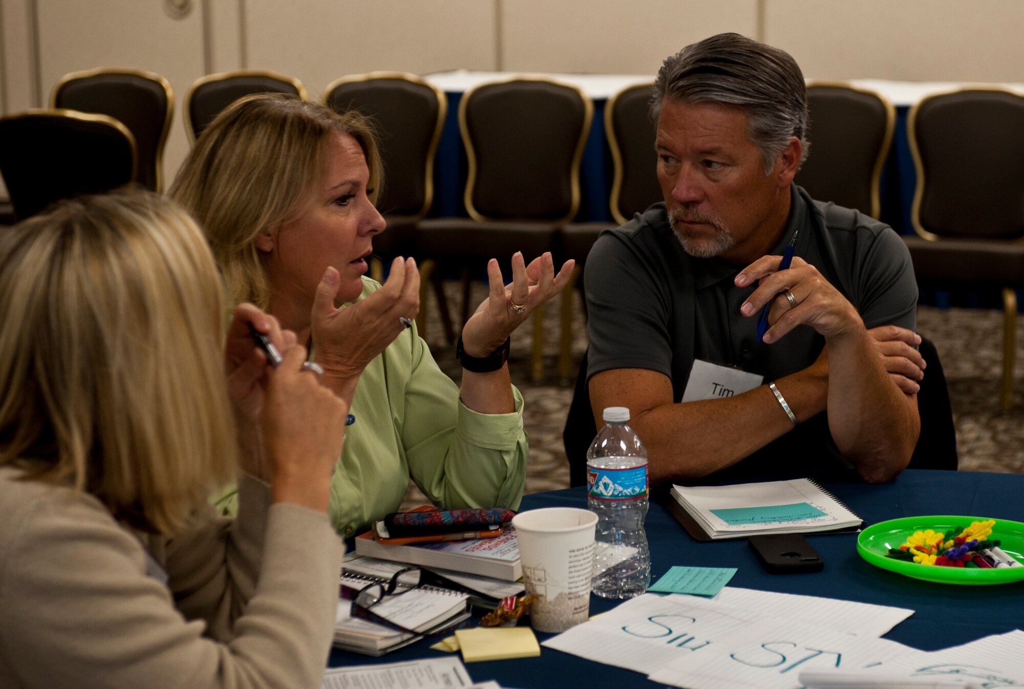 Attendees of the Military Child Education Coalition workshop discuss their opinions about how to best approach having military children in their schools Aug. 7, 2015,  in the Red Morgan Center at Fairchild Air Force Base, Wash. Attendees came from as close as Medical Lake, Wash., and from as far as Los Angeles. (U.S. Air Force photo/Airman Sean Campbell)