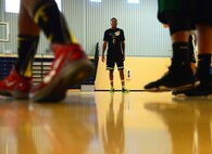 Airman Derrick Norman, 341st Force Support Squadron, plays a game of basketball amongst peers Aug. 12, 2015, at Malmstrom Air Force Base, Mont. Norman works at the Malmstrom Fitness and Sports Center where his love and knowledge of sports are helping him succeed in the 341st FSS. (U.S. Air Force photo/Airman 1st Class Magen M. Reeves)