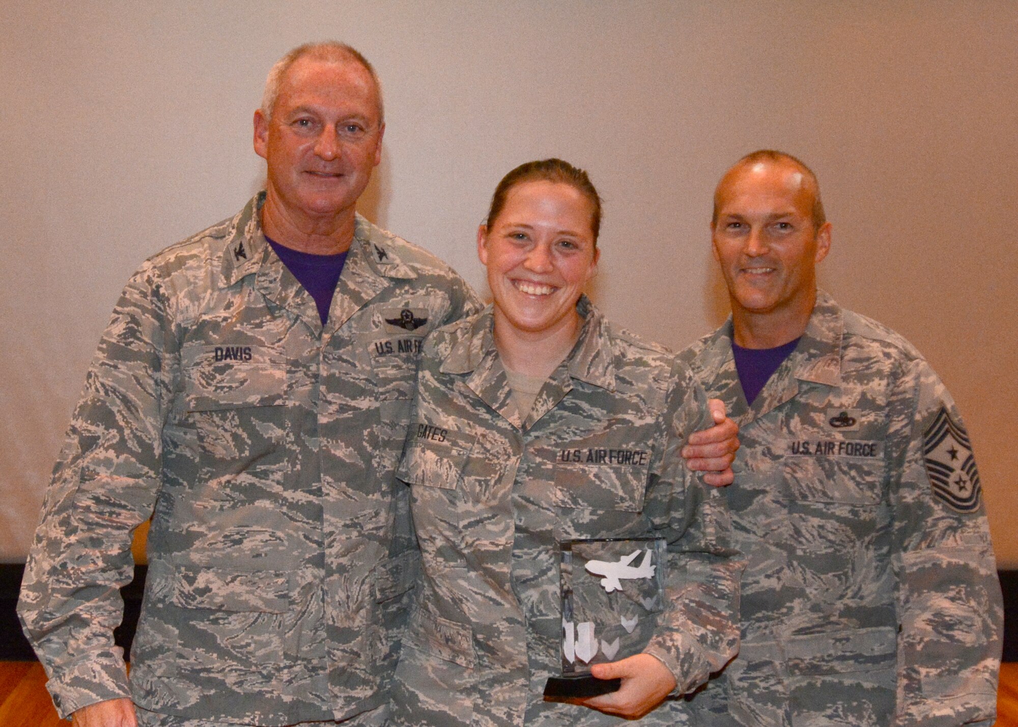 Senior Airman Natalee D. Gates, 507th Air Refueling Wing Command Post, accepts her award for Airman of the Quarter for the second quarter 2015 in the base theater at Tinker Air Force Base, Okla., August 9, 2015. (U.S. Air Force Photo/ Staff Sgt. Lauren Gleason)

