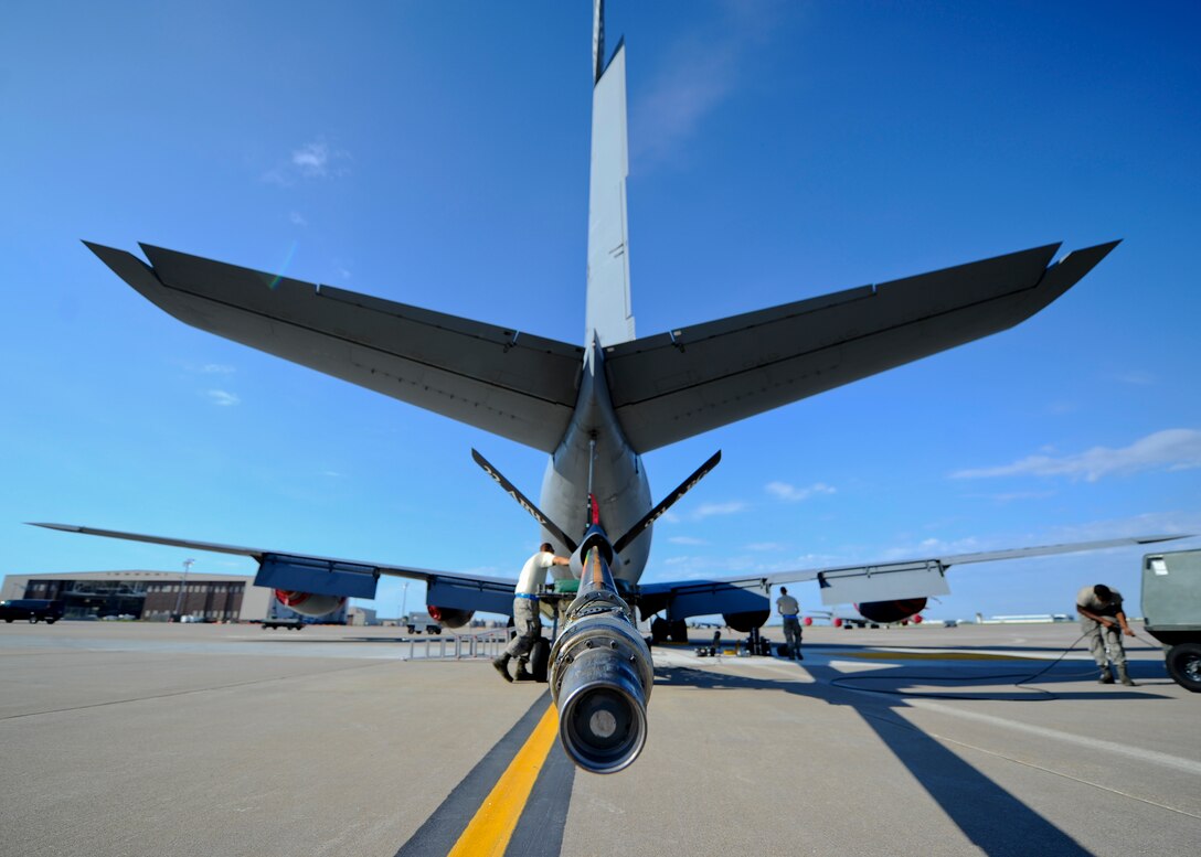 Airmen from the 22nd Aircraft Maintenance Squadron hydraulics shop inspect the boom of a KC-135 Stratotanker, Aug. 13, 2015, at McConnell Air Force Base, Kan. The Airmen were performing an hourly post-flight inspection on the aircraft, which is one of several dozen KC-135s assigned to McConnell, the Air Force’s premiere aerial refueling hub. (U.S. Air Force photo by Senior Airman Victor J. Caputo)