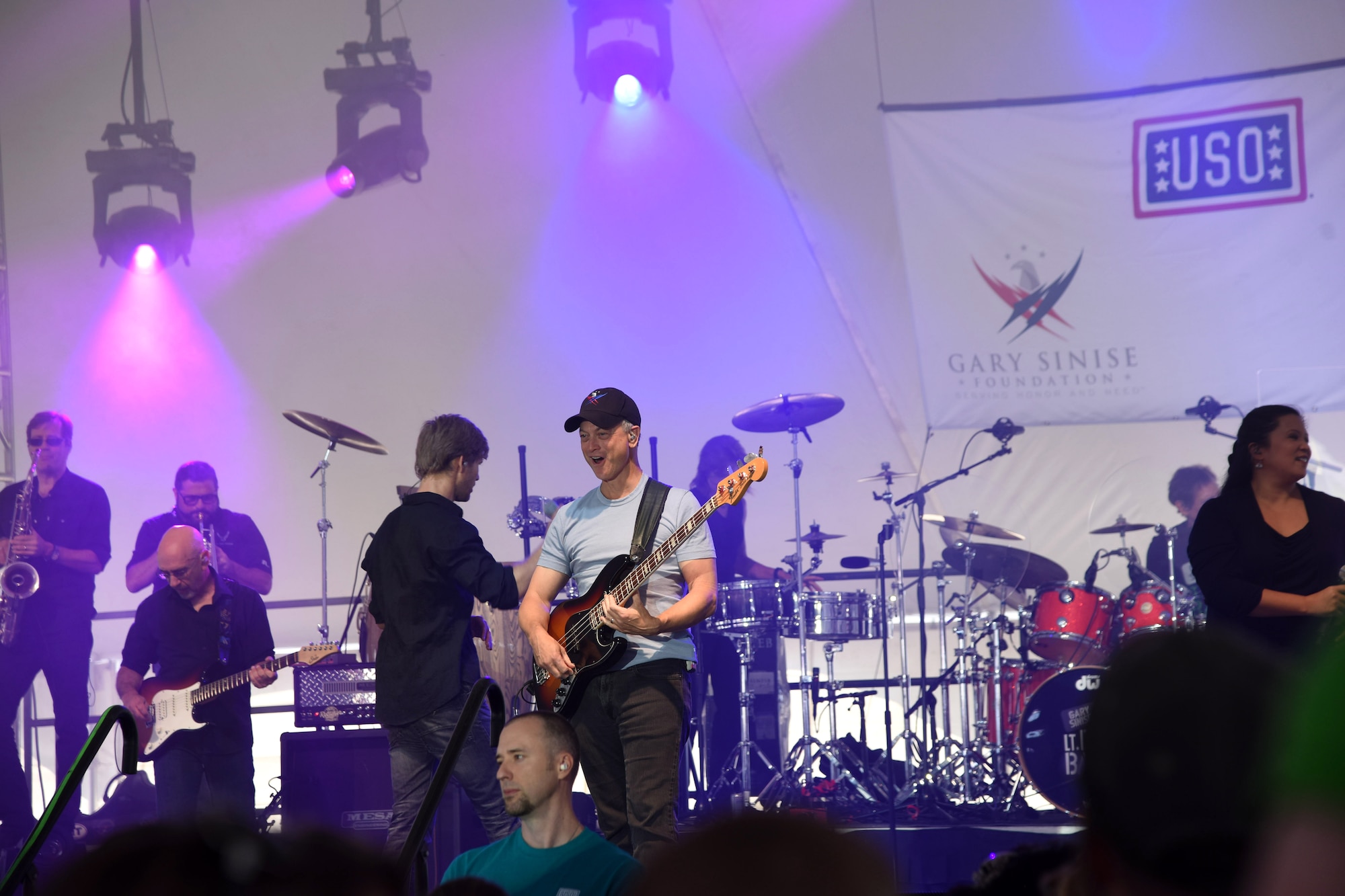 Gary Sinise, actor and Lt. Dan Band co-founder, plays a concert outside of Malmstrom Air Force Base’s Fitness and Sports Center Aug 16. Since its inception in 2003, the band has played hundreds of shows for military members all across the globe. (U.S. Air Force photo/Airman 1st Class Collin Schmidt)