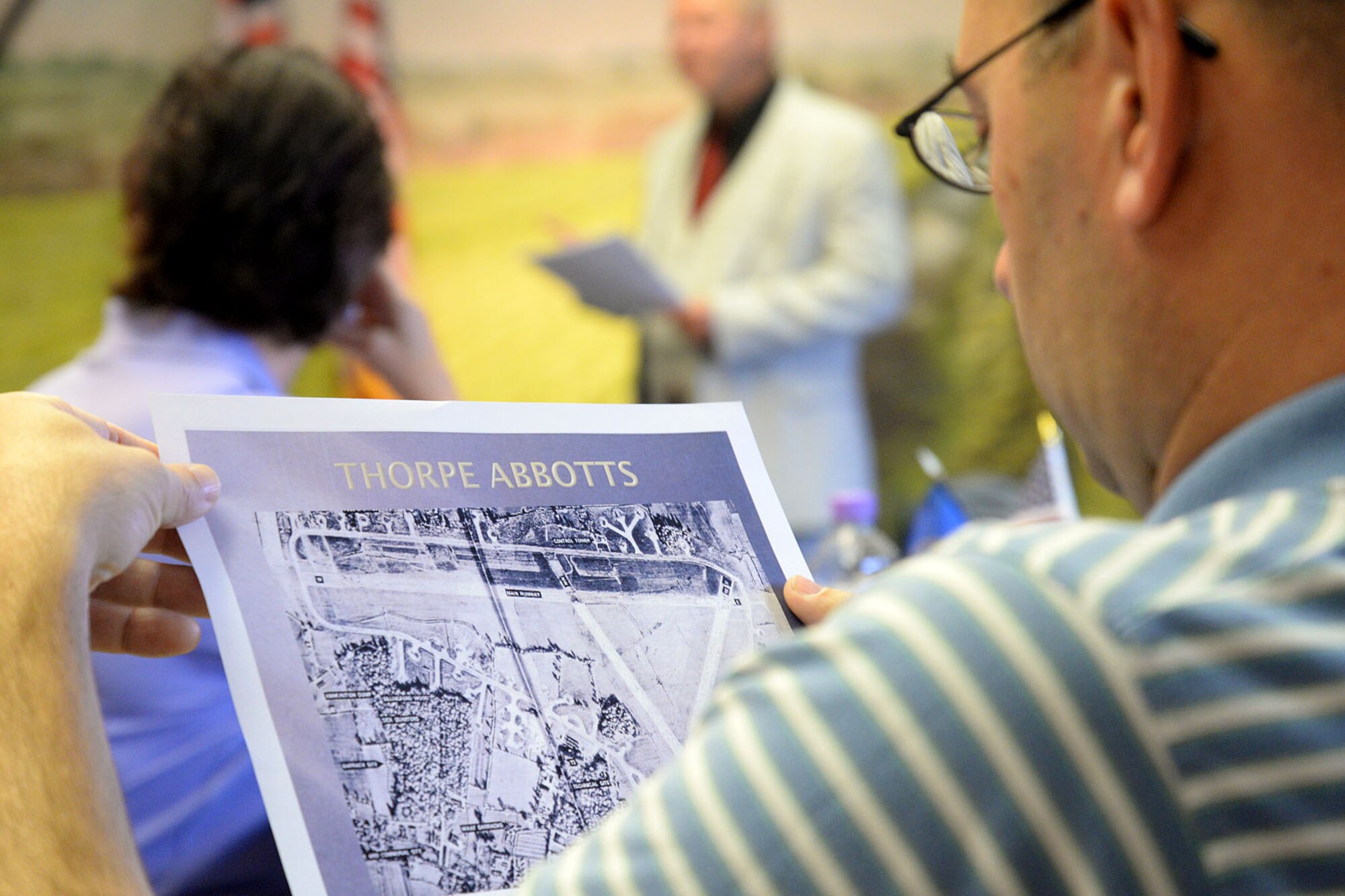 U.S. Air Force Lt. Col. Russell Aycock, 100th Mission Support Group deputy commander, reviews a historical map of Thorpe Abbots Aug. 14, 2015, during a senior leader staff visit to Thorpe Abbots in Norfolk, England, former home of the 100th Bombardment Group. After World War II the 100th BG made its way to RAF Mildenhall where it later became the 100th Air Refueling Wing. The wing leadership gathered in hopes of learning more about their unit’s history.  (U.S. Air Force photos by Senior Airman Kate Thornton/Released)