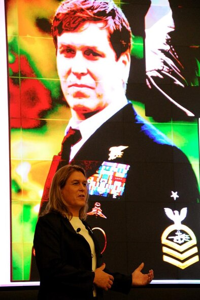 Retired Navy SEAL Senior Chief Petty Officer Kristin Beck speaks to attendees about being transgender and acceptance within the military during the Air Force Equal Opportunity Worldwide Functional Training Workshop on Joint Base Andrews, Md., Aug. 6, 2015. The event provided over 230 equal opportunity and human relations professionals with essential training to better the support they provide. (U.S. Air Force photo/Staff Sgt. Matt Davis)