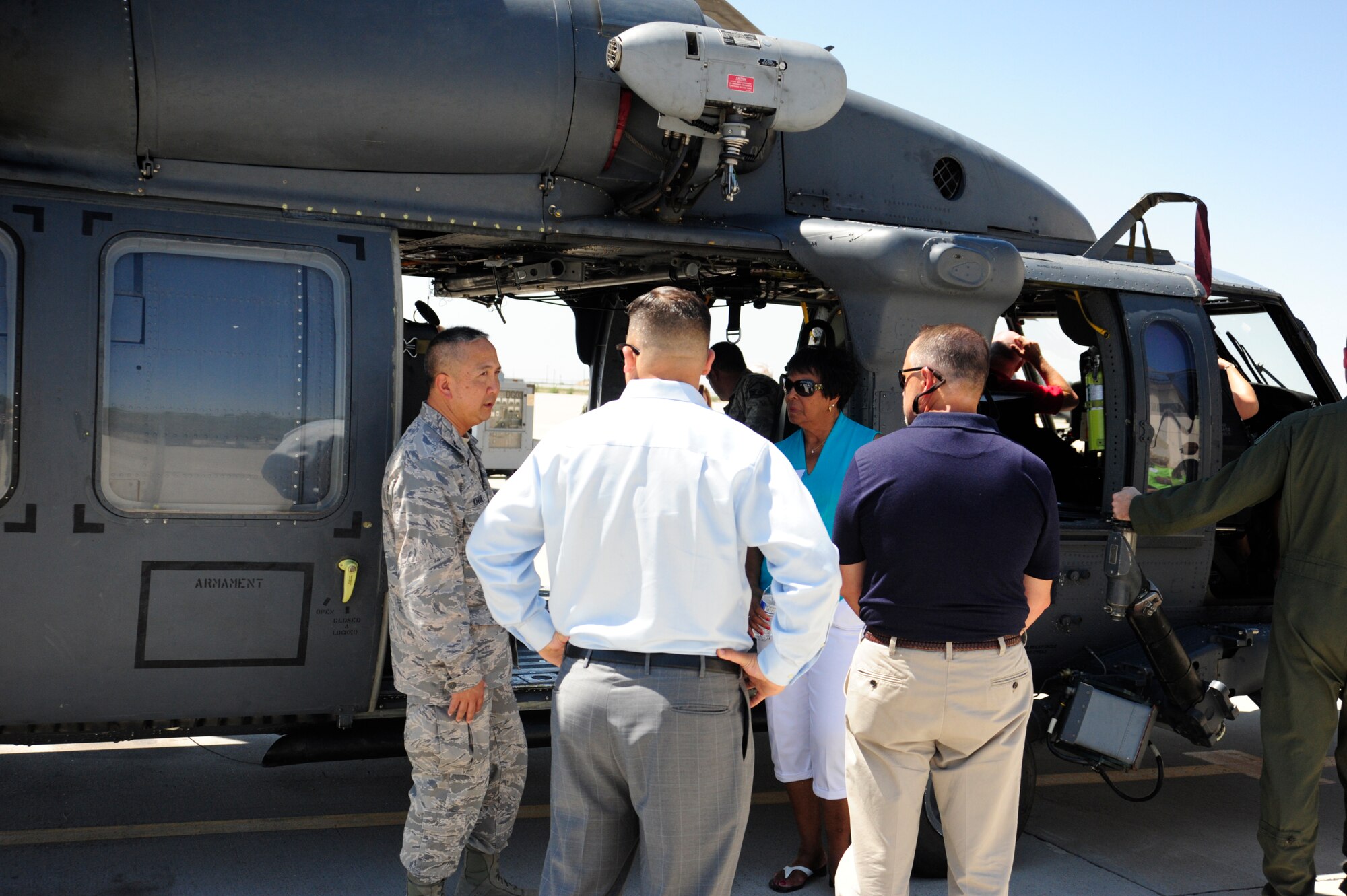 Col. Lance Kawane, 377th Air Base Wing vice commander talks with McChord Field civic leaders on the flight line at Kirtland Air Force Base, New Mexico, Aug. 13, 2015. The civic leaders were given a chance to view two of the aircraft assigned to the 58th Special Operations Wing, one of the 100 associate units there. (U.S. Air Force photo/Staff Sgt. Katie Jackson)