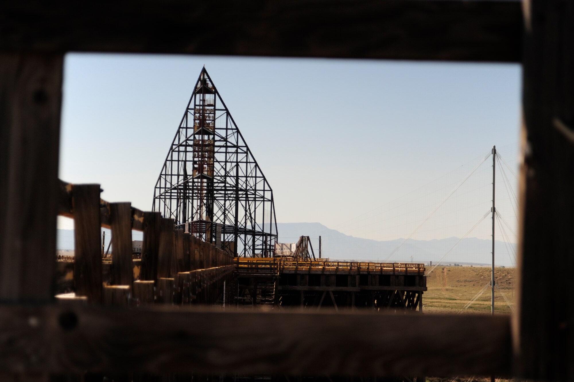 A photo of the Trestle, a 12-story tall, built entirely out of wood structure that helped win the Cold War, was taken Aug. 13, 2015 at Kirtland Air Force Base, New Mexico. More than 20 civic leaders from McChord had a chane to visit this world’s largest electromagnetic pulse simulator as part of the 2015 McChord Field Fly-away Civic Leaders tour . (U.S. Air Force photo/Staff Sgt. Katie Jackson)