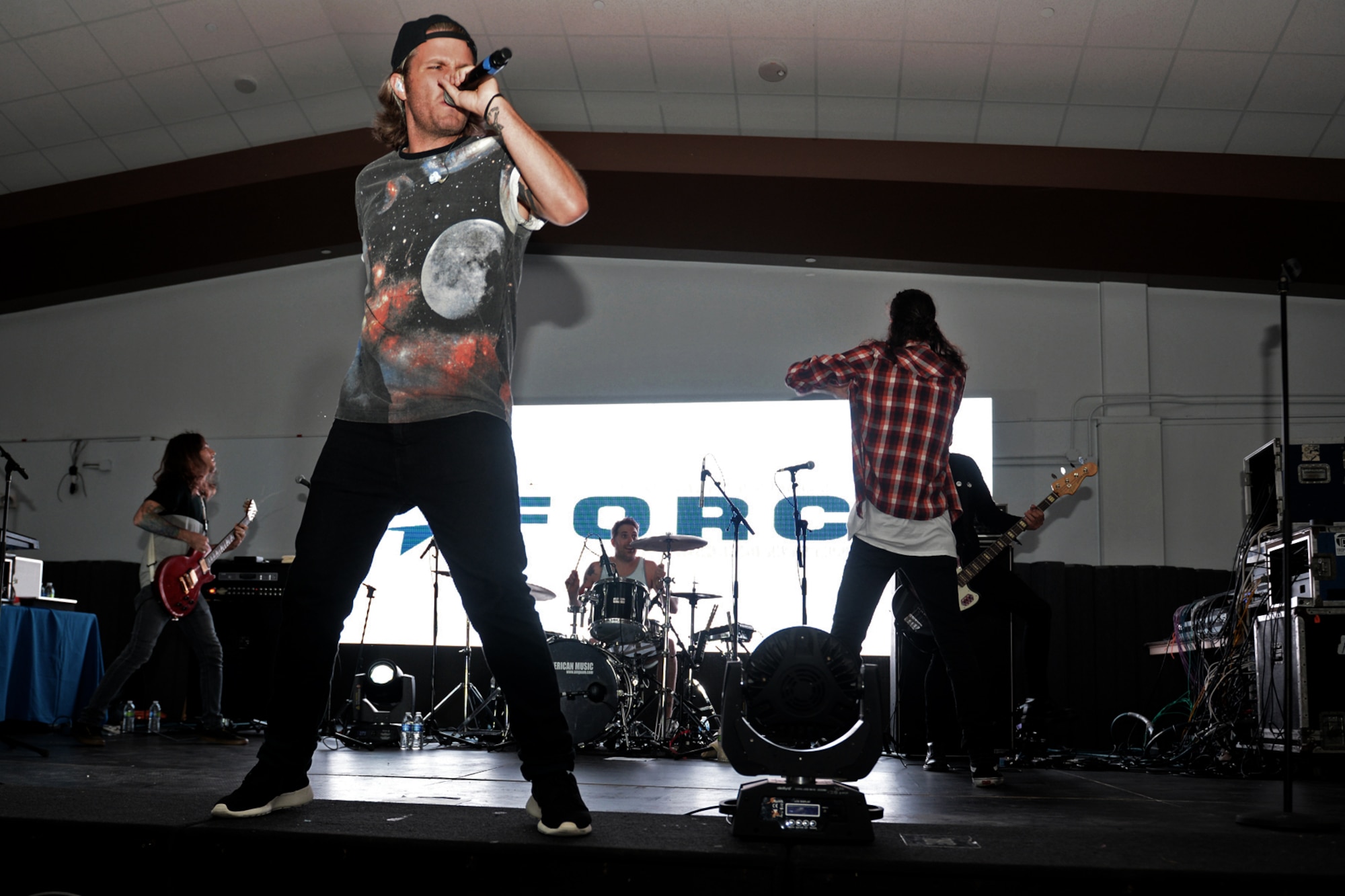 Sean Foreman performs with his electronic music group 3OH!3 for Airmen and family members Aug. 16, 2015, at Andersen Air Force Base, Guam. The concert was held at the Sunrise Conference Center after a weekend of heavy rain. (U.S. Air Force photo by Airman 1st Class Alexa Ann Henderson/Released)