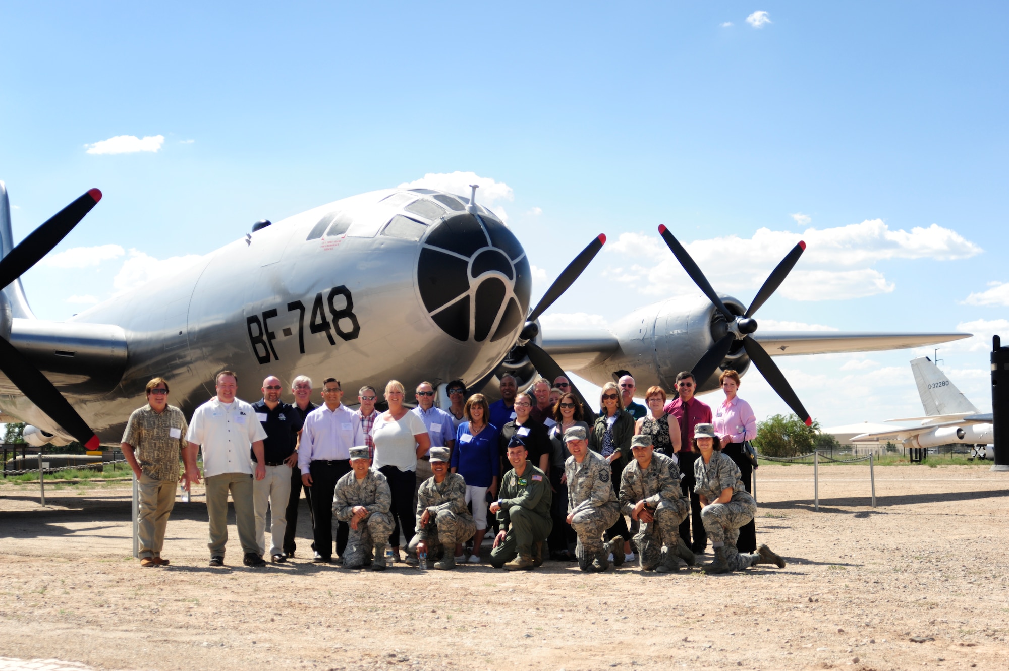McChord civic leaders pose for a photo in front of the Boeing B-29 Superfortress outside of The National Museum of Nuclear Science and History at Kirtland AFB, New Mexico, Aug. 12, 2015. From two days, more than 20 civic leaders from the Joint Base Lewis-McChord, Wa., area visited Kirtland AFB as part of the 2015 McChord Field Fly-away Civic Leader Tour. (U.S. Air Force photo/Staff Sgt. Katie Jackson)