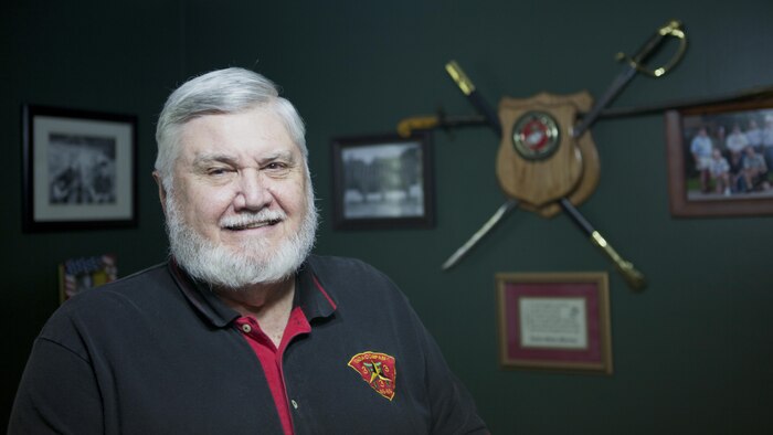 Charles "Charlie" Fink, Marine Vietnam veteran, stands in a room of his house decorated with Marine Corps memorabilia and photos June 2, 2015 at his home in Lake Butler, Florida. Fink served with 3rd Battalion, 3rd Marine Regiment, 3rd Marine Division, during his deployment in Vietnam.