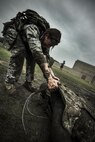 A female subject drags a 185-pound simulated casualty, June 19, 2015, as she is assessed by a researcher from the Air Force Fitness Testing and Standards Unit, supporting the Physical Fitness Tests and Standards study at Joint Base San Antonio-Lackland, Texas. The Airman is a volunteer in the fitness study, which supports the Air Force’s Women in Service Review. The study aims to establish occupationally-specific, operationally-relevant physical fitness standards for Battlefield Airmen. All male and female subjects undergo 39 physical fitness tests and 15 physical task simulations to link fitness tests and standards to real world operational tasks and requirements. (U.S. Air Force Photo by 1st Lt. Jose R. Davis) 
