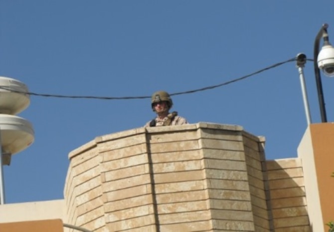 An MSAU Marine stands guard at U.S. Consulate Erbil during a heightened security situation, September 11, 2014.