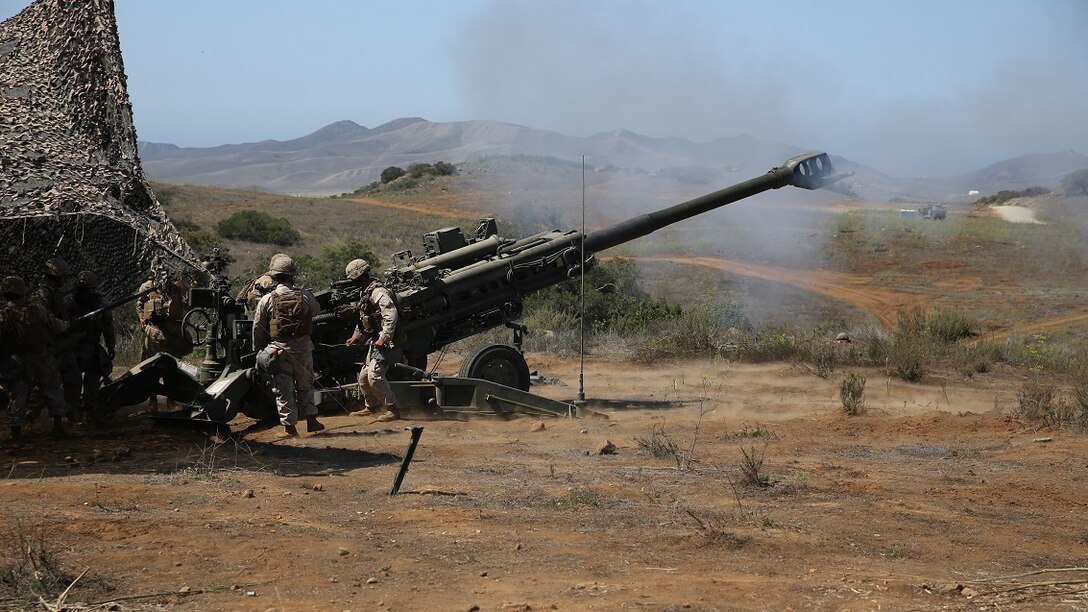 Marines with Battery B, 2nd Battalion, 11th Marine Regiment, 1st Marine Division fire an M777 Howitzer during Summer Fire Exercise 15, at Marine Corps Base Camp Pendleton, Calif., Aug. 13, 2015. The exercise, which spans Aug. 6-17, provides an opportunity for Marines to practice standing operating procedures for coordinating and executing fire missions in preparation for future operations.