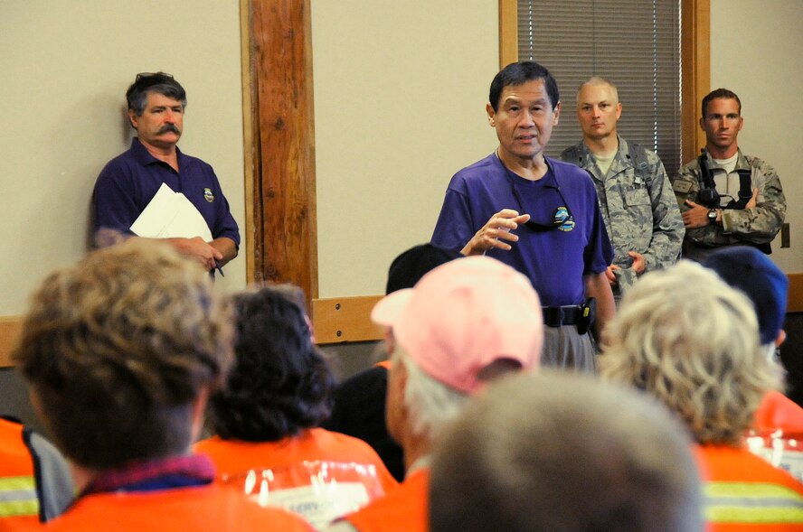 Dr. Jon Jui, Oregon Disaster Medical team lead, delivers a morning brief to the participants taking part in the Pathfinder-Minutemen Exercise, Aug. 5, 2015 at Camp Rilea in Warrenton, Oregon. The event is a joint multi-agency, multi-state disaster preparedness exercise based on response to a possible Cascadia Subduction Zone event. Officials believe the Northwest is overdue for a magnitude 7.0 or greater earthquake. (U.S. Air National Guard photo by Tech. Sgt. John Hughel, 142nd Fighter Wing Public Affairs/Released)