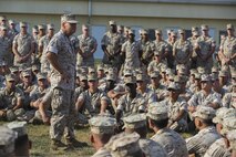 Lt. Gen. Robert B. Neller, commander of U.S. Marine Corps Forces Command and U.S. Marine Forces Europe and confirmed 37th Commandant of the Marine Corps, speaks with Marines and sailors with the Black Sea Rotational Force during his visit at Mihail Kogalniceanu Air Base, Romania, Aug. 16, 2015. Marines with 3rd Battalion, 8th Marine Regiment, 2nd Marine Division assumed responsibility for the current rotation of BSRF and will spend the next several months training with partner nations to forge stronger bonds and strengthen regional security. (U.S. Marine Corps photo by LCpl. Melanye E. Martinez)