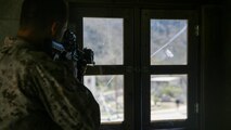 A Marine with 2nd Battalion, 7th Marine Regiment sights in on a simulated enemy during the culminating event of 1st Marine Division Schools’ Urban Leaders Course at Marine Corps Base Camp Pendleton, Calif., Aug. 12, 2015. The course is a 15-day period of instruction that includes classwork, combat marksmanship and physical training executed in a simulated urban combat environment. 
