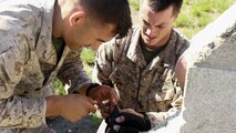 Marines with 1st Battalion, 7th Marine Regiment, and 2nd Battalion, 7th Marine Regiment, set a simulated booby trap to alert nearby Marines when an enemy is attempting to infiltrate their position during the culminating event of 1st Marine Division Schools’ Urban Leaders Course at Marine Corps Base Camp Pendleton, Calif., Aug. 12, 2015. The course is a 15-day period of instruction that includes classwork, combat marksmanship and physical training executed in a simulated urban combat environment. 