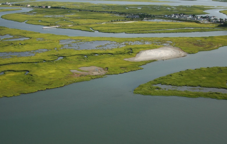 An aerial photo shows the results of a marsh restoration demo project. In the summer of 2014, the U.S. Army Corps of Engineers’ Philadelphia District partnered with state, local, and non-profit organizations to beneficially use dredged material to restore degraded marsh and create habitat on land owned and managed by the New Jersey Division of Fish & Wildlife.