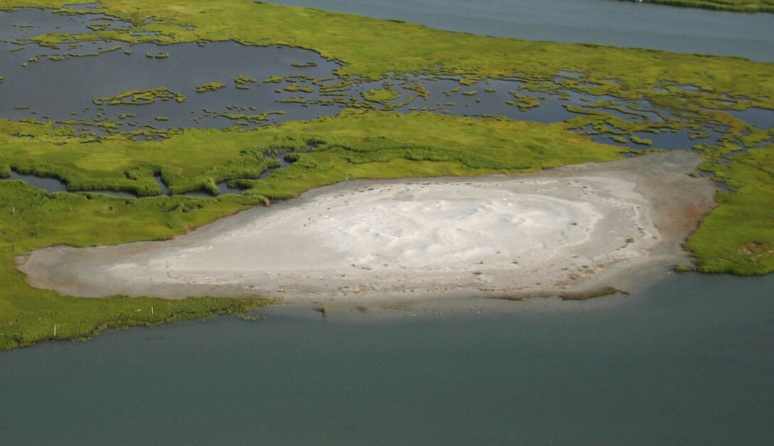 An aerial photo shows the results of a marsh restoration demo project. In the summer of 2014, the U.S. Army Corps of Engineers’ Philadelphia District partnered with state, local, and non-profit organizations to beneficially use dredged material to restore degraded marsh and create habitat on land owned and managed by the New Jersey Division of Fish & Wildlife.