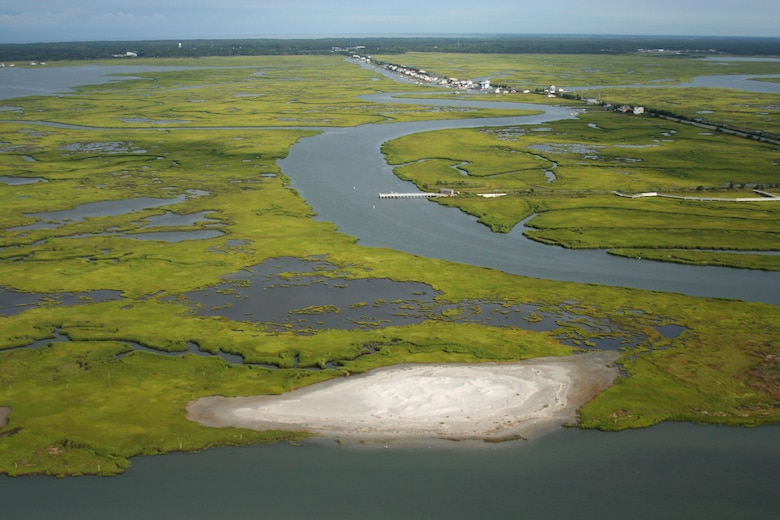 An aerial photo shows the results of a marsh restoration demo project. In the summer of 2014, the U.S. Army Corps of Engineers’ Philadelphia District partnered with state, local, and non-profit organizations to beneficially use dredged material to restore degraded marsh and create habitat on land owned and managed by the New Jersey Division of Fish & Wildlife.