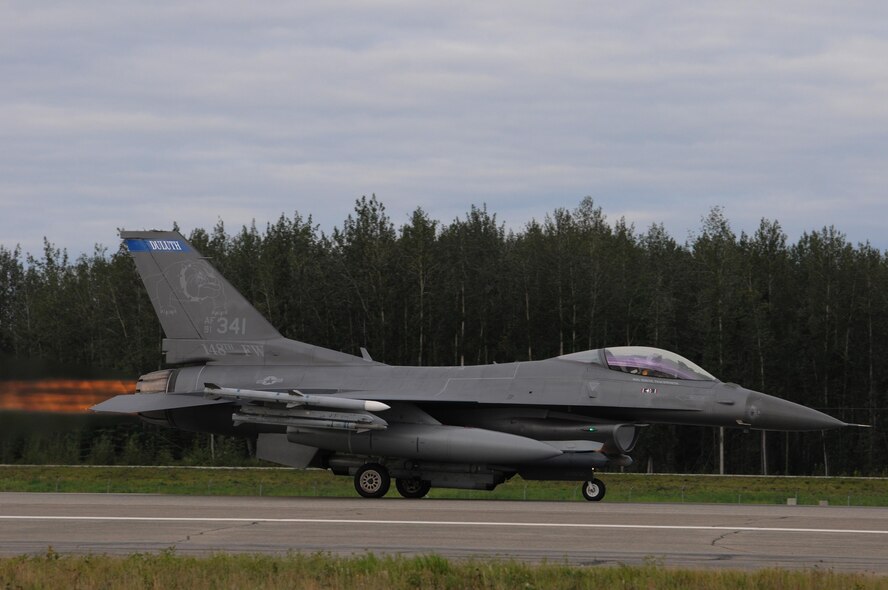 A U.S. Air Force F-16 Fighting Falcon from the 148th Fighter Wing, Duluth, Minnesota, takes-off at Eielson Air Force Base, Alaska, Aug. 11, 2015, during RED FLAG-Alaska 15-3.  RF-A is a Pacific Air Forces commander-directed field training exercise for U.S. and partner nation forces, providing combined offensive counter-air, interdiction, close air support and large force employment training in a simulated combat environment.  (U.S. Air Force photo by Master Sgt. Ralph Kapustka/Released)