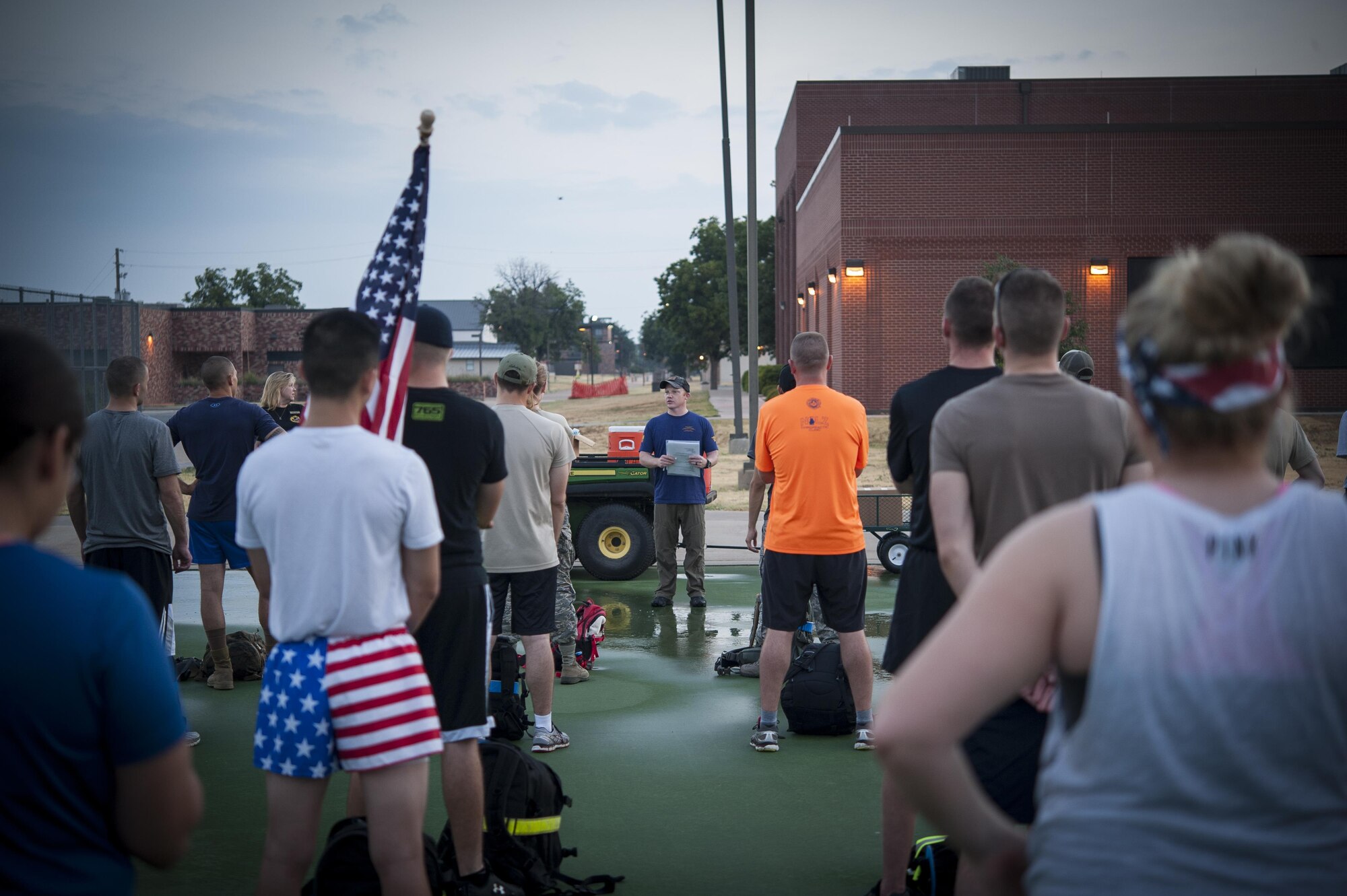 Drew, GORUCK special operations cadre, goes over ground rules for the Team Cohesion Challenge at the Mathis Fitness Center on Goodfellow Air Force Base, Texas, Aug. 15, 2015. The goal of the event was to encourage team building though strenuous physical activity and remove cultural biases between military services. (U.S. Air Force photo by Staff Sgt. Michael Smith/Released)