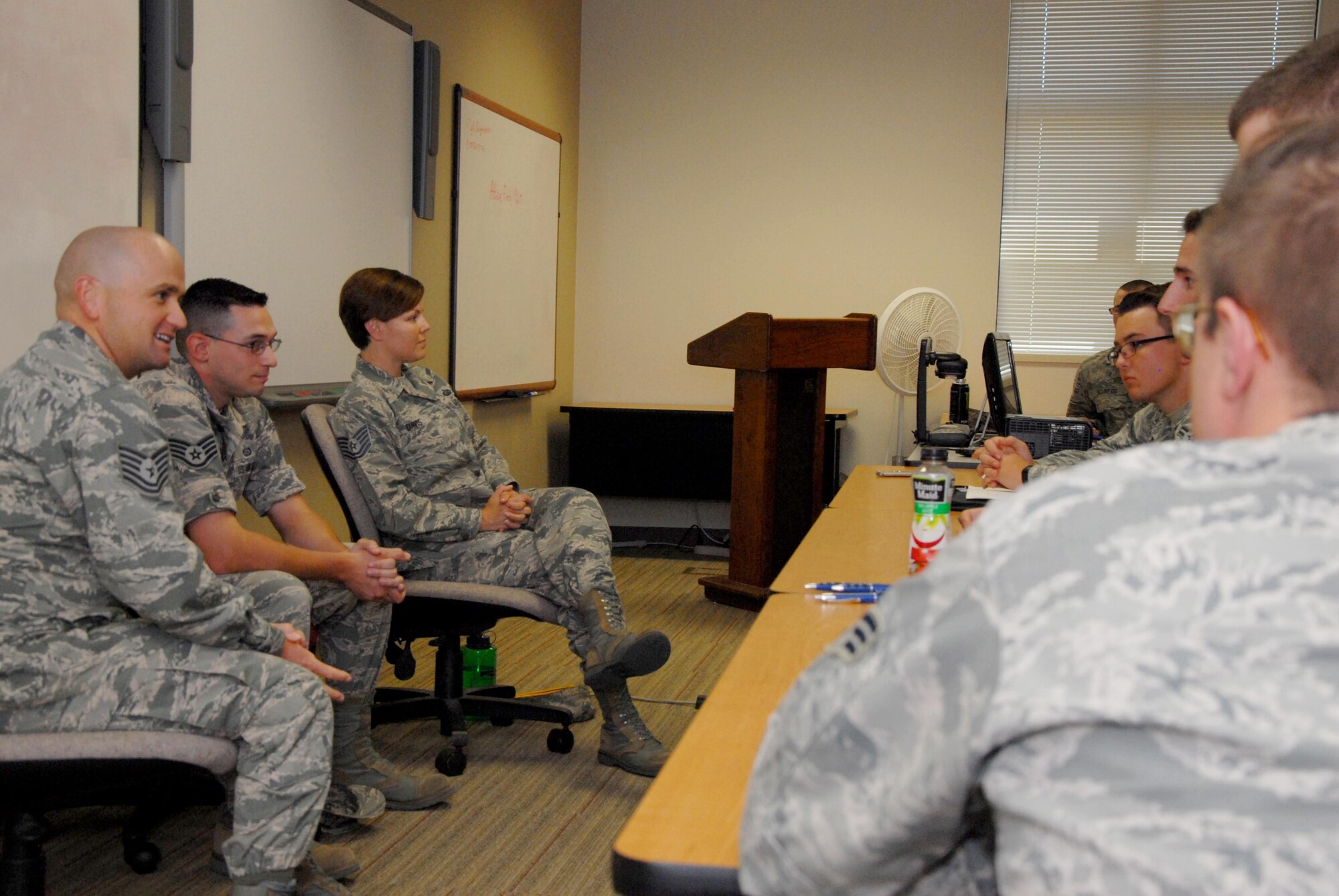NCOs speak with Airmen during an Airmen Professional Development Course at the Consolidated Learning Center on Goodfellow Air Force Base, Texas, Aug. 10, 2015. Among other topics, the course featured NCO and chief master sergeant panels, where junior-enlisted members could ask questions. (U.S. Air Force photo by Senior Airman Joshua Edwards/Released)