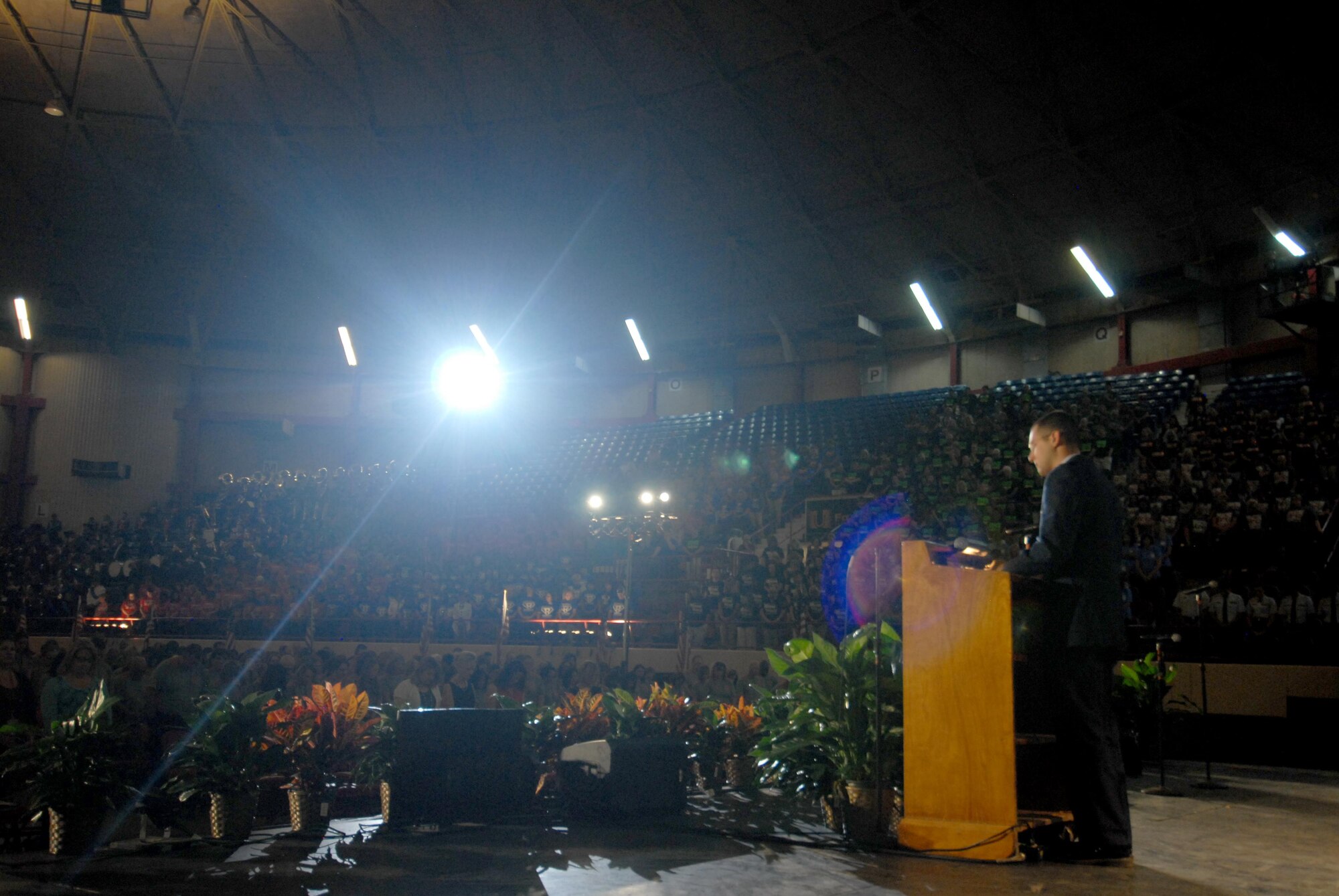 U.S. Air Force Capt. Bryan J. Fox, 17th Training Wing Chaplain, gives the invocation at the San Angelo Independent School District convocation in the Foster Communication Coliseum, San Angelo, Texas, Aug. 18, 2015. SAISD hosts this event annually to celebrate the beginning of the school year. (U.S. Air Force photo by Senior Airman Joshua Edwards/Released)
