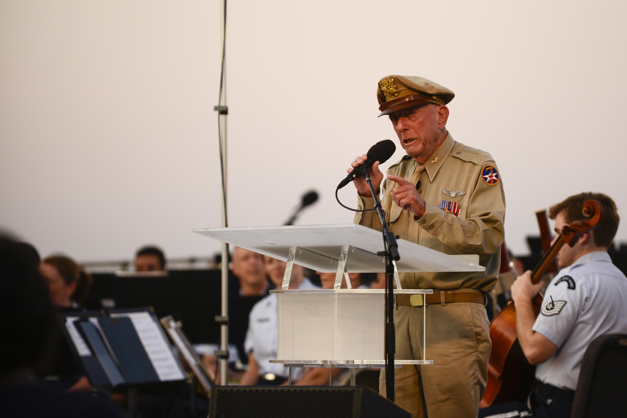 Retired Army Air Corps Capt. Jerry Yellin speaks briefly before taking part in a wreath-laying ceremony commemorating the 70th anniversary of the end of World War II, Aug. 14, 2015, at the Air Force Memorial in Arlington, Virginia. There was also a four-ship P-51 Mustang flyover, as well as a concert performed by the Air Force Band.  (Air Force photo/Tech. Sgt. Joshua L. DeMotts)