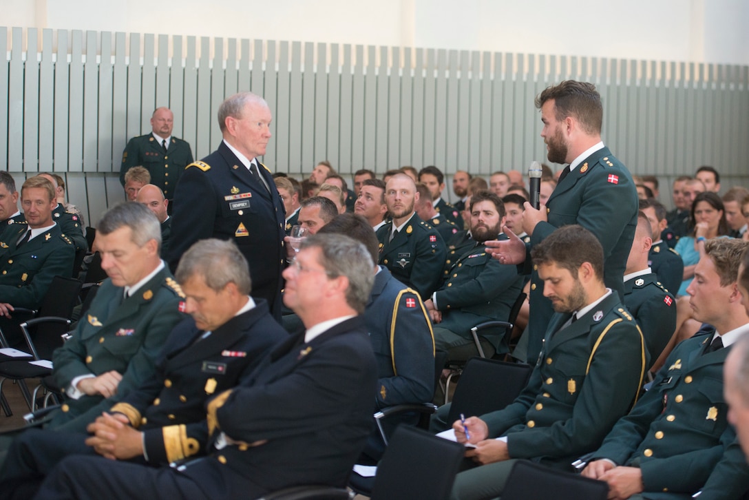 A Danish army cadet ask a question to U.S. Army Gen. Martin E. Dempsey, chairman of the Joint Chiefs of Staff, at the Royal Danish Army Academy in Copenhagen, Denmark, Aug. 17, 2015. DoD photo by D. Myles Cullen