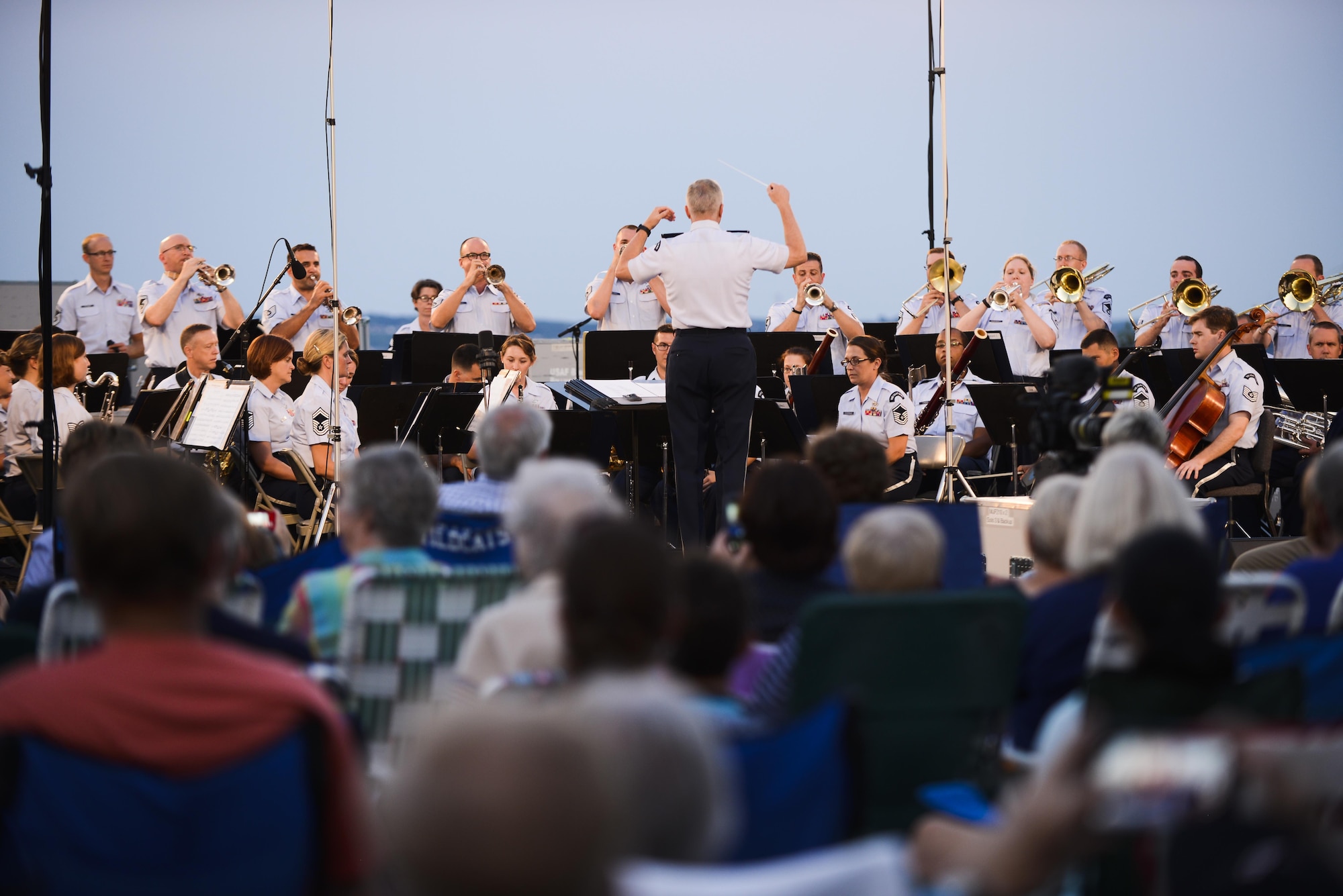 The Air Force Band plays music from the World War II era after a wreath-laying ceremony and a four-ship P-51 Mustang flyover at the Air Force Memorial in Arlington, Va., Aug. 14, 2015, to commemorate the 70th anniversary of the end of World War II.    (Air Force photo/Tech. Sgt. Joshua L. DeMotts)