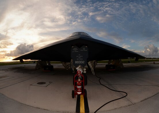 A U B-2 Spirit is prepared for a mission on the flightline at Andersen Air Force Base, Guam, Aug. 12, 2015. Three B-2s and about 225 Airmen from Whiteman AFB, Missouri, deployed to Guam to conduct familiarization training activities in the Indo-Asia-Pacific region. (U.S. Air Force photo/Senior Airman Joseph A. Pagán Jr.)