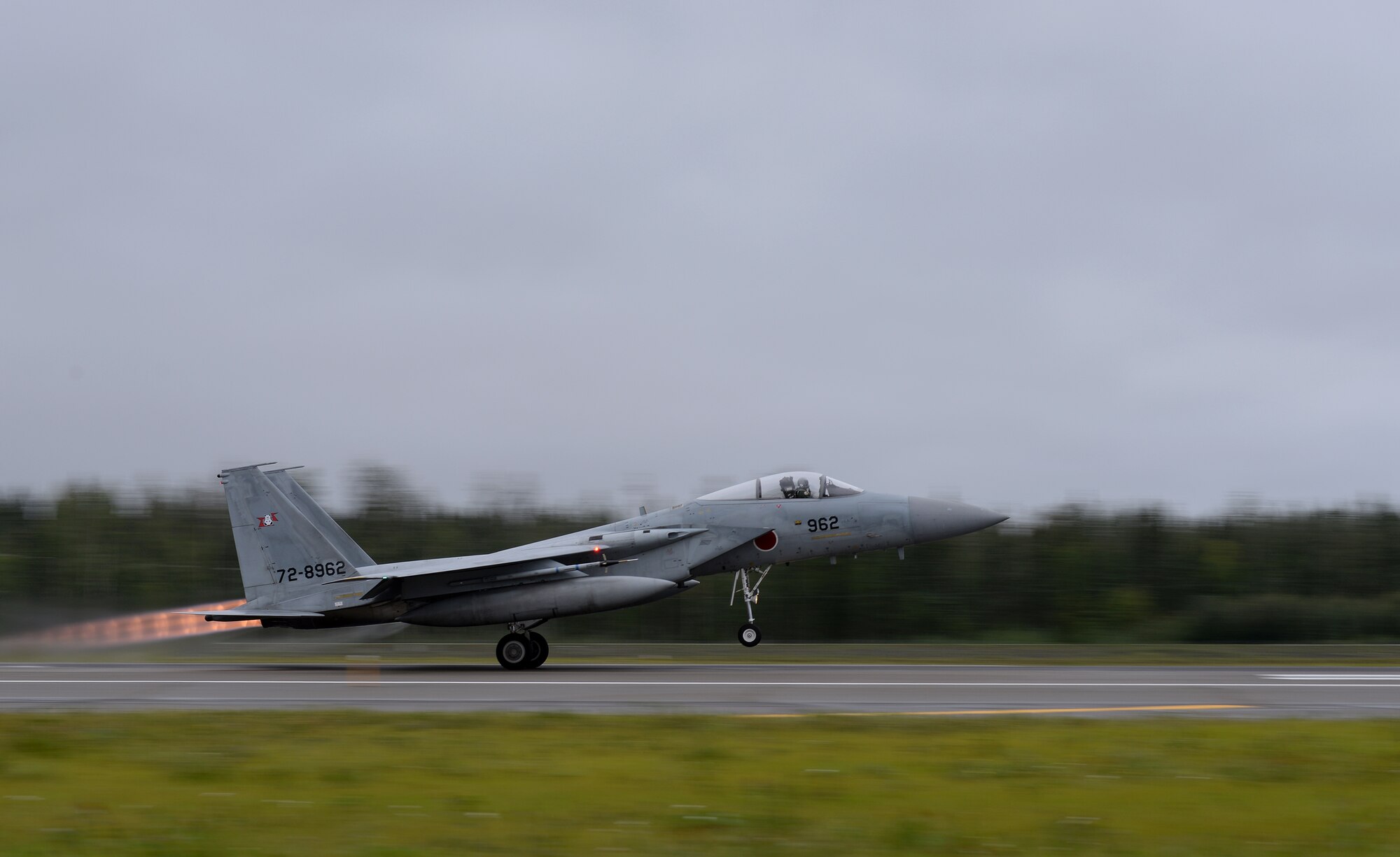 A Japan Air Self-Defense Force (JASDF) F-15J Eagle takes off from Eielson Air Force Base, Alaska, Aug. 10, 2015, during RED FLAG-Alaska (RF-A) 15-3. JASDF and Republic of Korea Air Force units are deployed to Eielson along with assorted tanker, transport, fighter, and electronic warfare aircraft, as well as support personnel from multiple U.S. service branches for RF-A, a series of Pacific Air Forces commander-directed field training exercises for U.S. and partner nation forces, providing combined offensive counter-air, interdiction, close air support, and large force employment training in a simulated combat environment. (U.S. Air Force photo by Master Sgt. Karen J. Tomasik/Released)