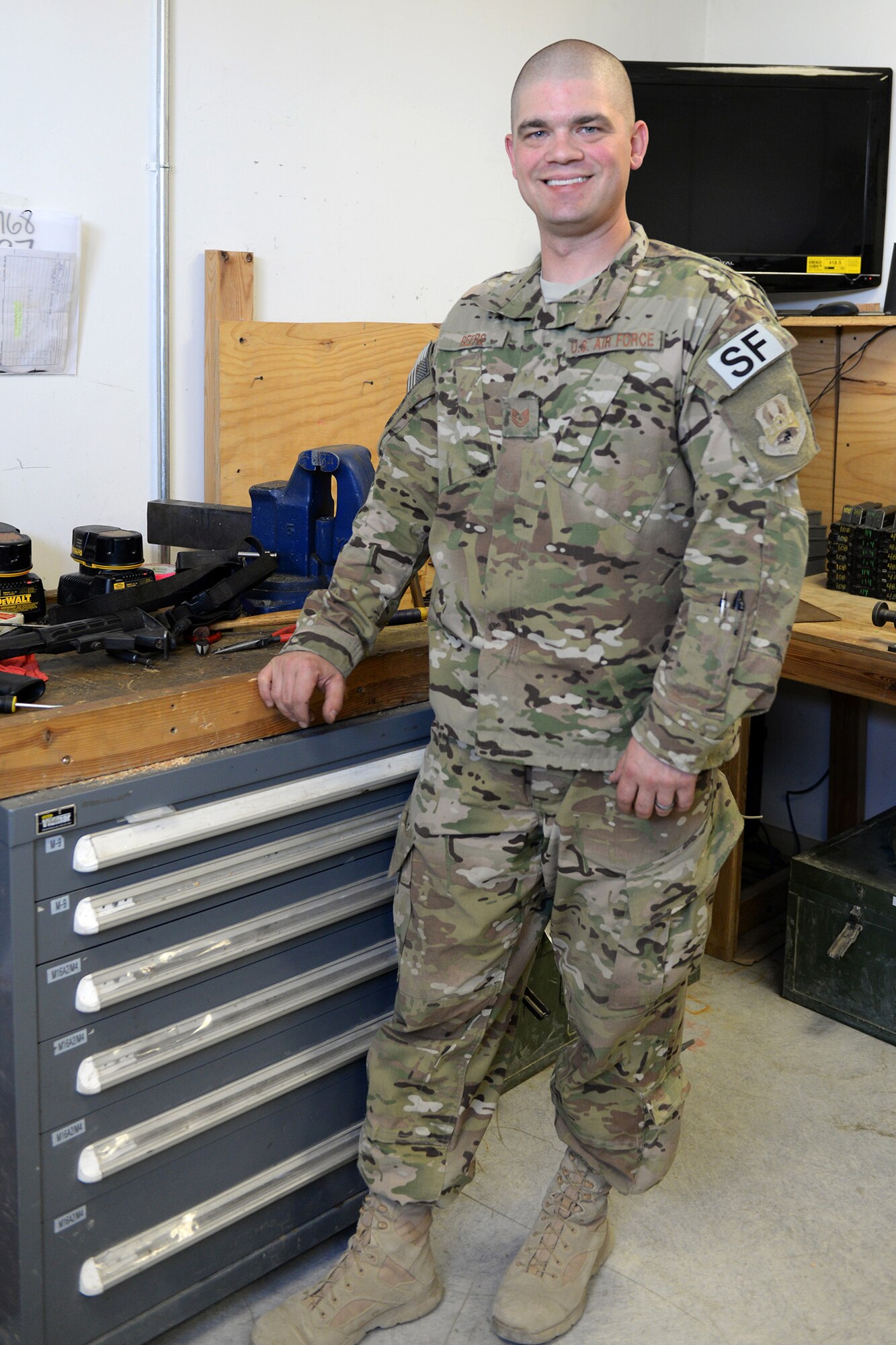 Tech. Sgt. Kevin Beers, 446th Security Forces Squadron combat arms instructor, out of Joint Base Lewis-McChord, Wash., searches for weapons parts for an M-4 rifle Aug. 10, 2015, at Bagram Air Field, Afghanistan. Beers is deployed as the CATM instructor for the 455th Expeditionary Security Forces Squadron. As Bagram’s only weapons repairman, he’s responsible for repairing weapons for the security forces squadron, logistics readiness squadron, Marines and all other units out of Bagram. (U.S. Air Force photo by Senior Airman Cierra Presentado)