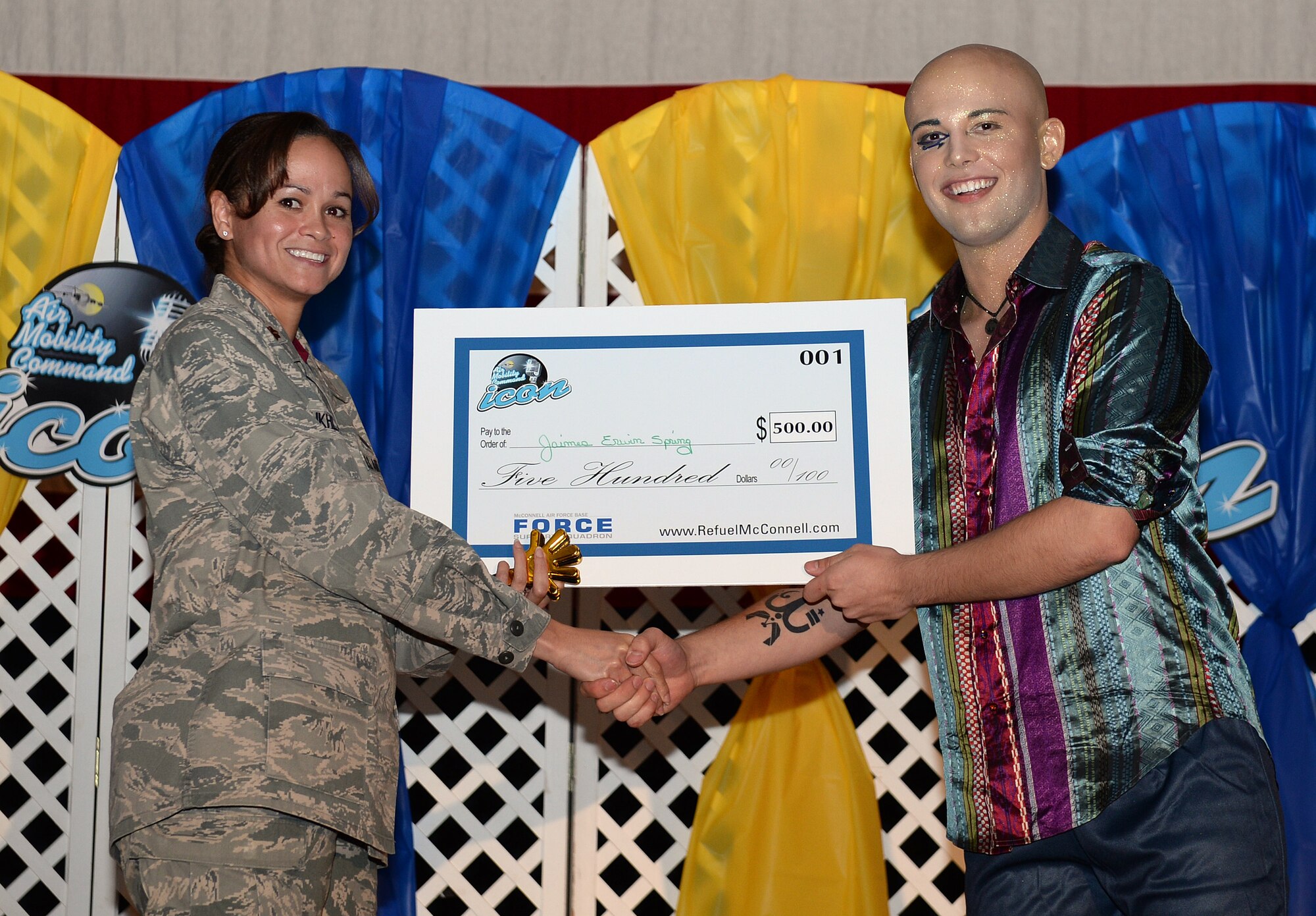 The 2015 Air Mobility Command Icon qualification round was held Aug. 14, 2015, at the Robert J. Dole Community Center. Contestants put their vocal cords to the test for the top prize of $500. The winner of the competition was Senior Airman Jaimes Erwin-Spring, 22nd Air Refueling Wing paralegal. (U.S. Air Force photo by Senior Airman Colby L. Hardin)