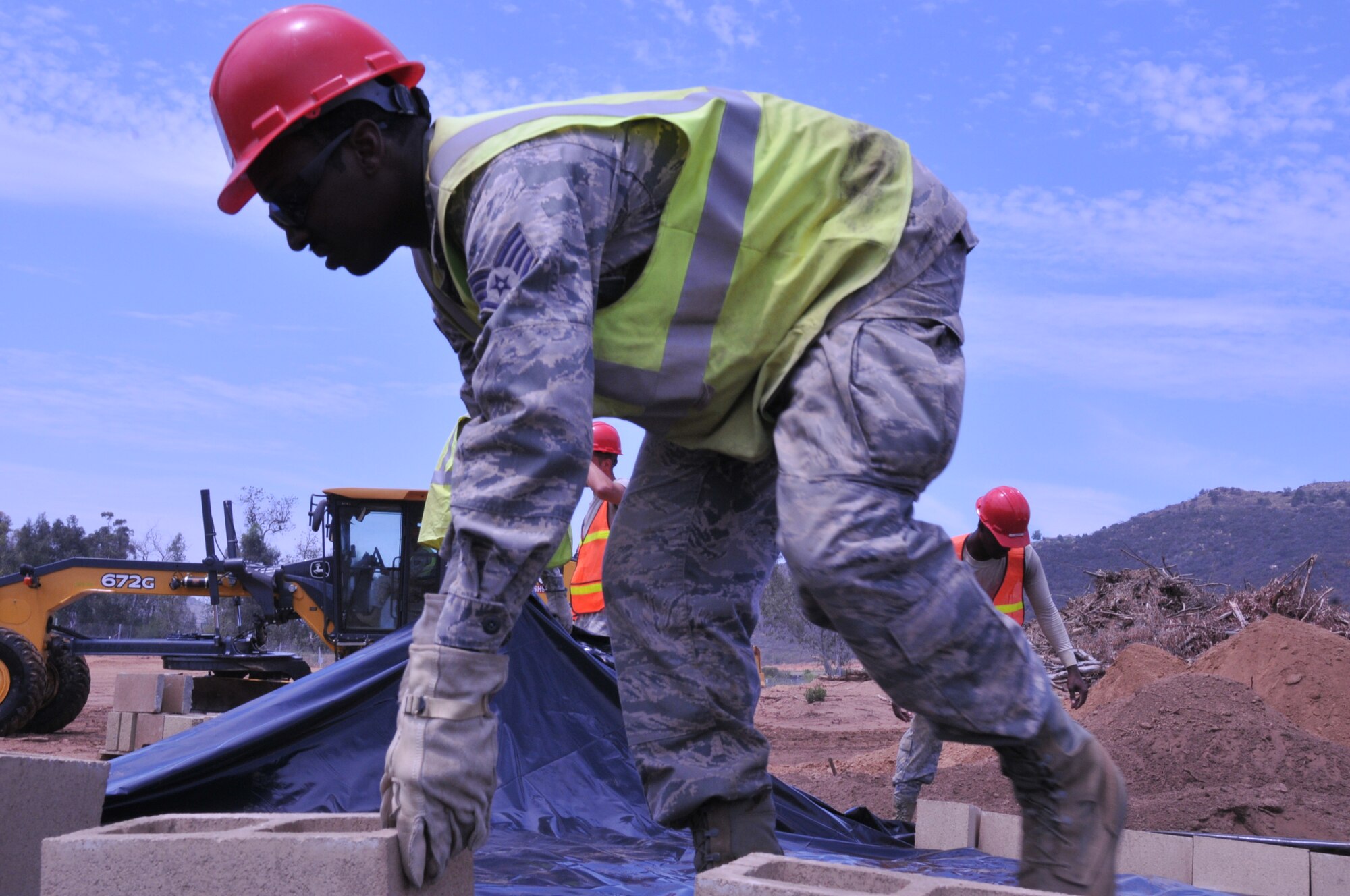 An Airman with the 567th Rapid Engineer Deployable Heavy Operational Repair Squadron Engineers from Seymour Johnson Air Force Base, North Carolina, takes part in the Training, Education, Research, and Innovation (TERI) Campus of Life project in San Marcos, California, during their annual tour in June. (U.S. Air Force photo/Tech. Sgt. Terrica Jones)