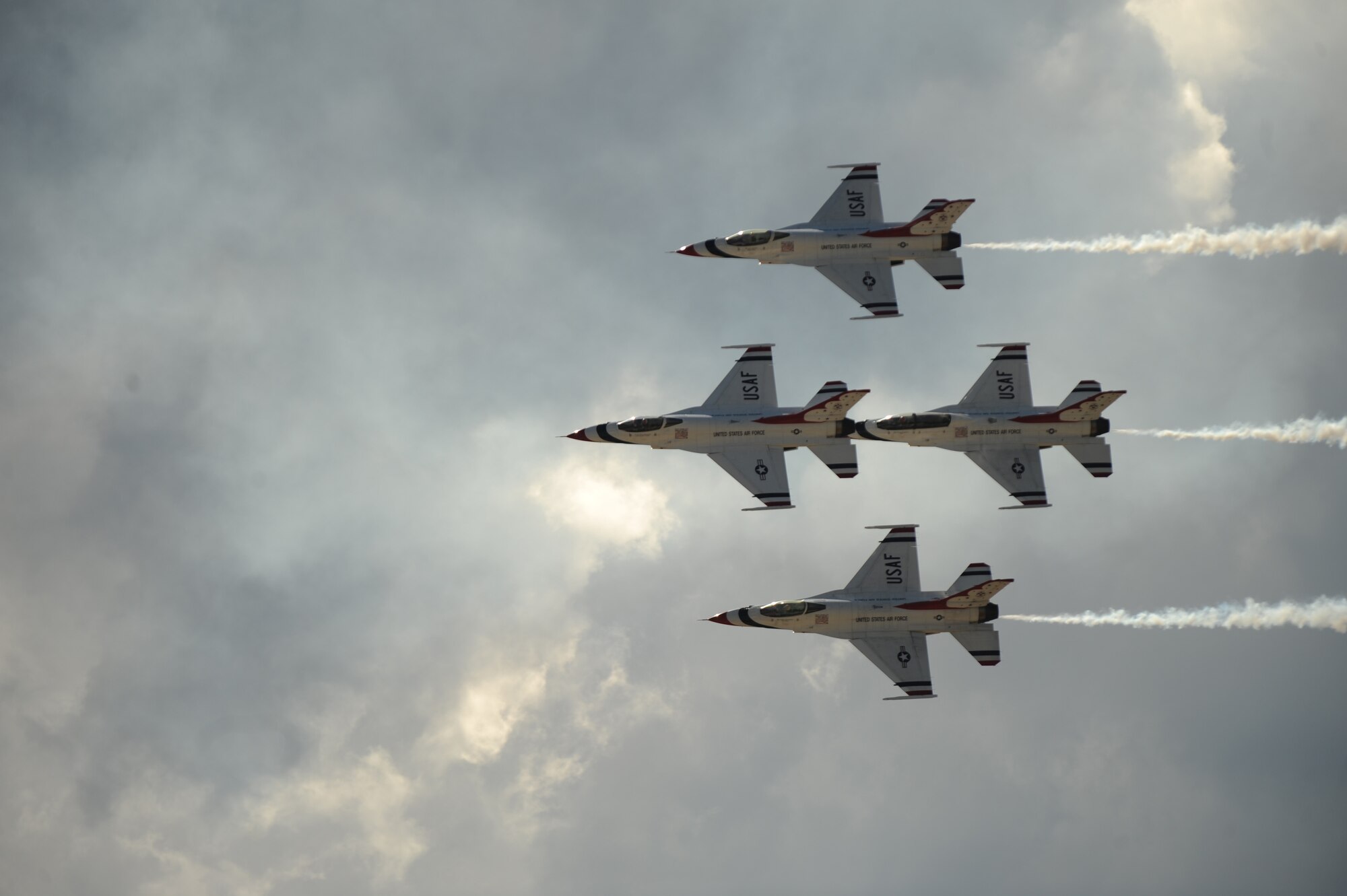 The Thunderbirds fly by in their diamond opener formation during the 2015 Dakota Thunder airshow and open house at Ellsworth Air Force Base S.D., Aug. 15, 2015. Ellsworth held the airshow to show its appreciation to the public for its support of the U.S. military over the years. (U.S. Air Force photo by Airman Sadie Colbert/Released)
